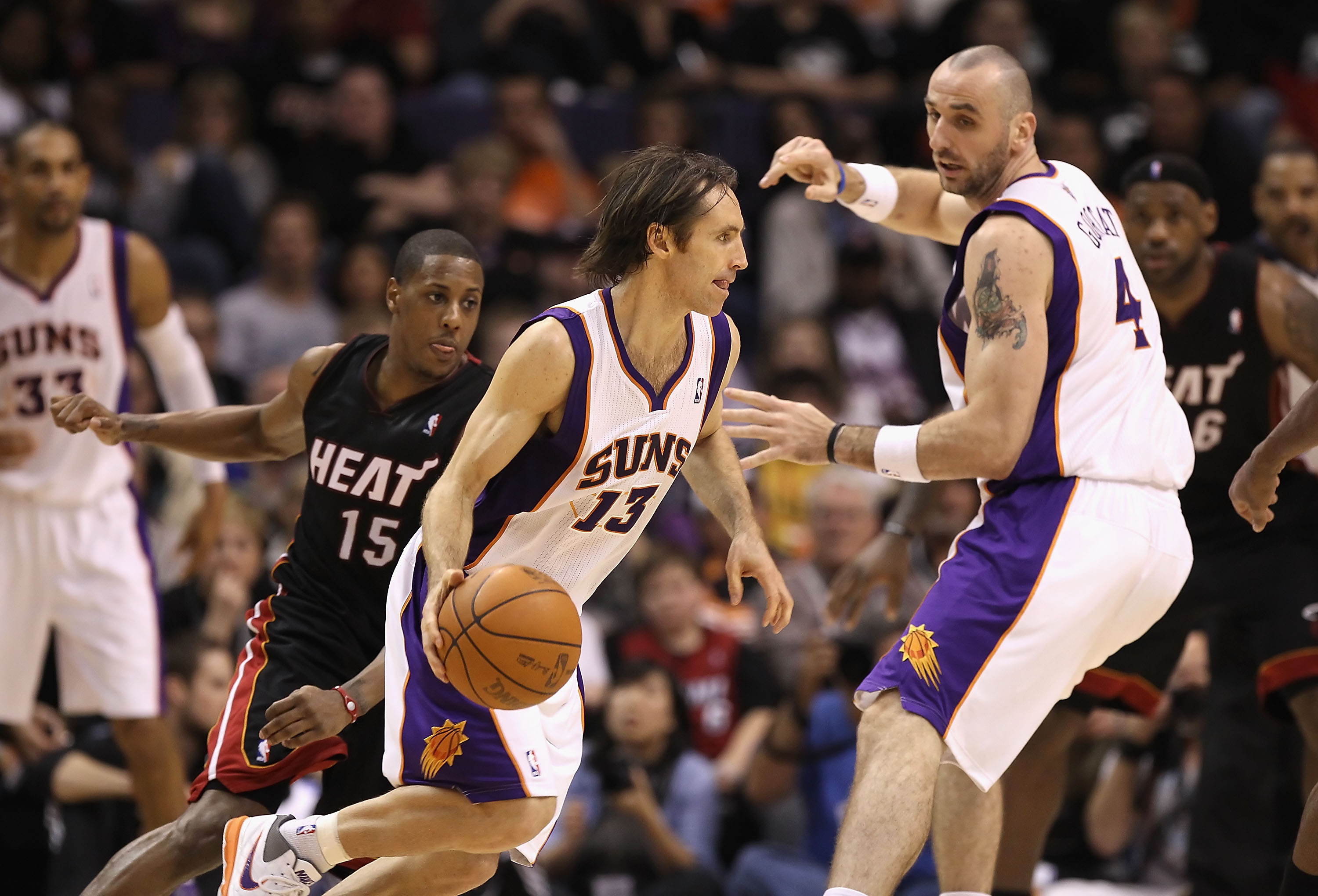 PHOENIX - DECEMBER 23:  Steve Nash #13 of the Phoenix Suns drives the ball against the Miami Heat during the NBA game at US Airways Center on December 23, 2010 in Phoenix, Arizona. The Heat defeated the Suns 95-83. NOTE TO USER: User expressly acknowledge