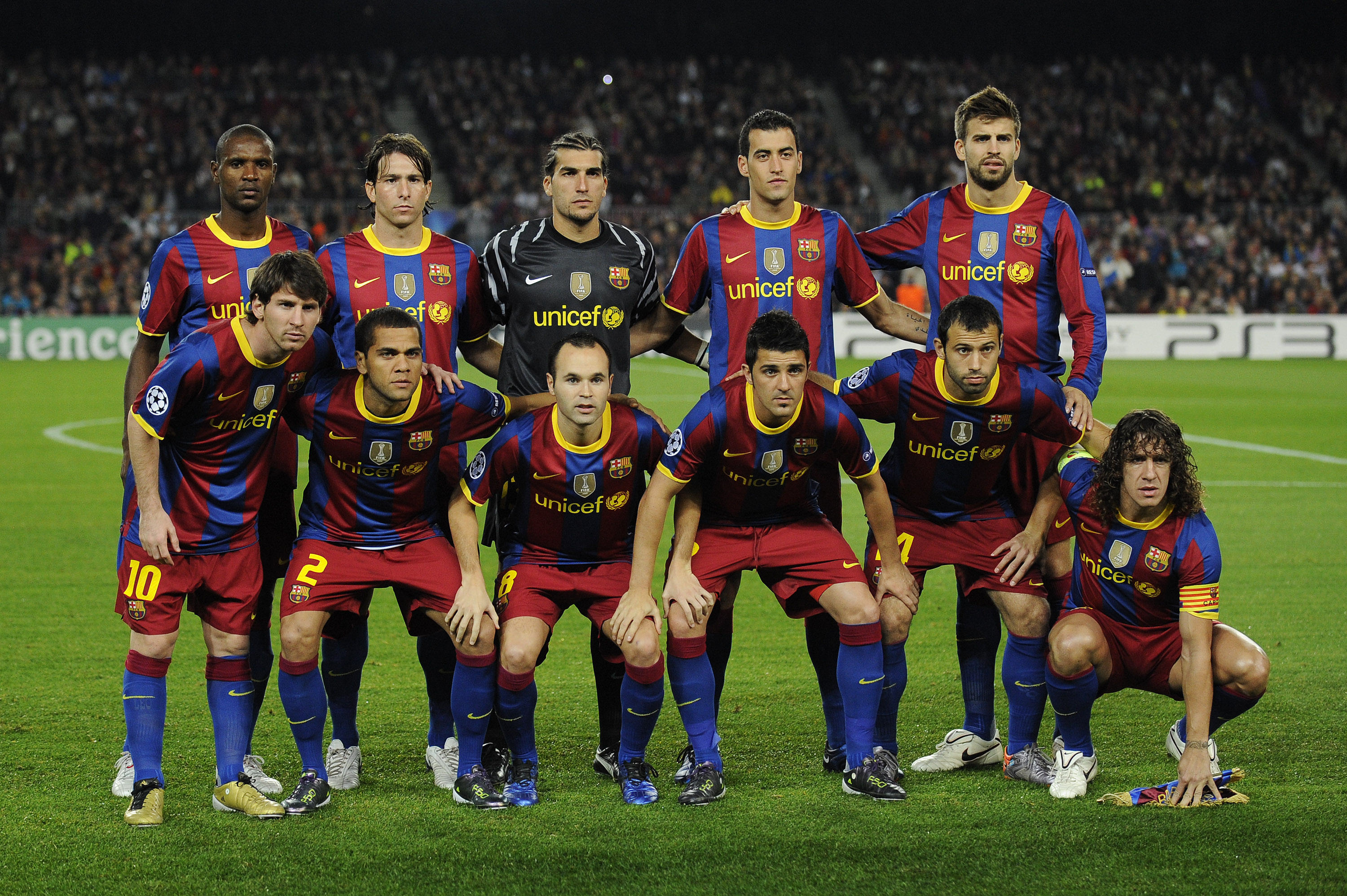 BARCELONA, SPAIN - OCTOBER 20:  Barcelona players (From L-R) Eric Abidal, Lionell Messi, Maxwell, Daniel Alves, Jose Pinto, Andres Iniesta, David Villa, Sergio Busquets, Javier Mascherano, Gerard Pique, Carles Puyol pose for a team picture during the UEFA