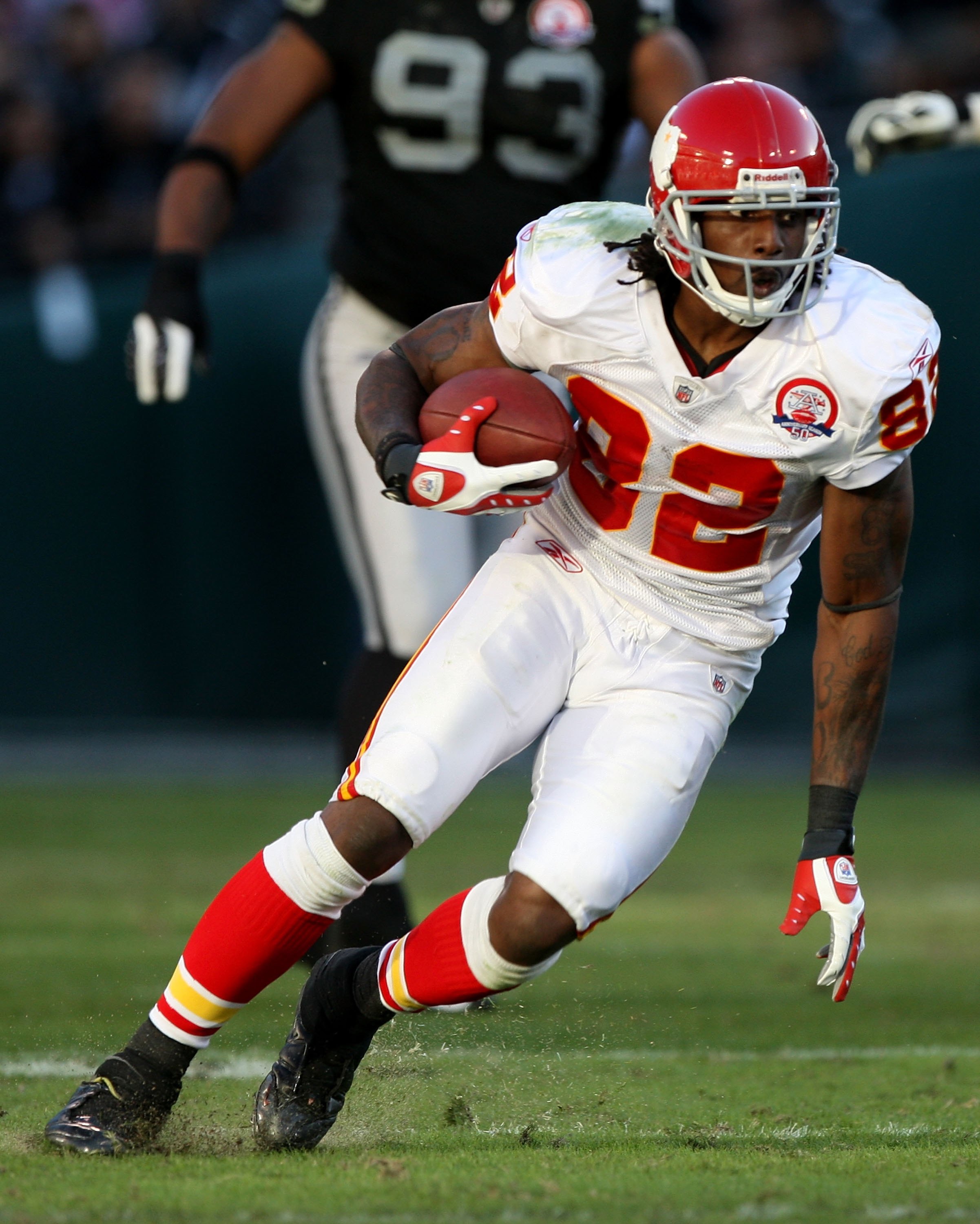 Kansas City Chiefs wide receiver Dwayne Bowe (82) carries the ball during  the first half of an NFL football game against the Miami Dolphins, Sunday,  Sept. 21, 2014, in Miami Gardens, Fla. (