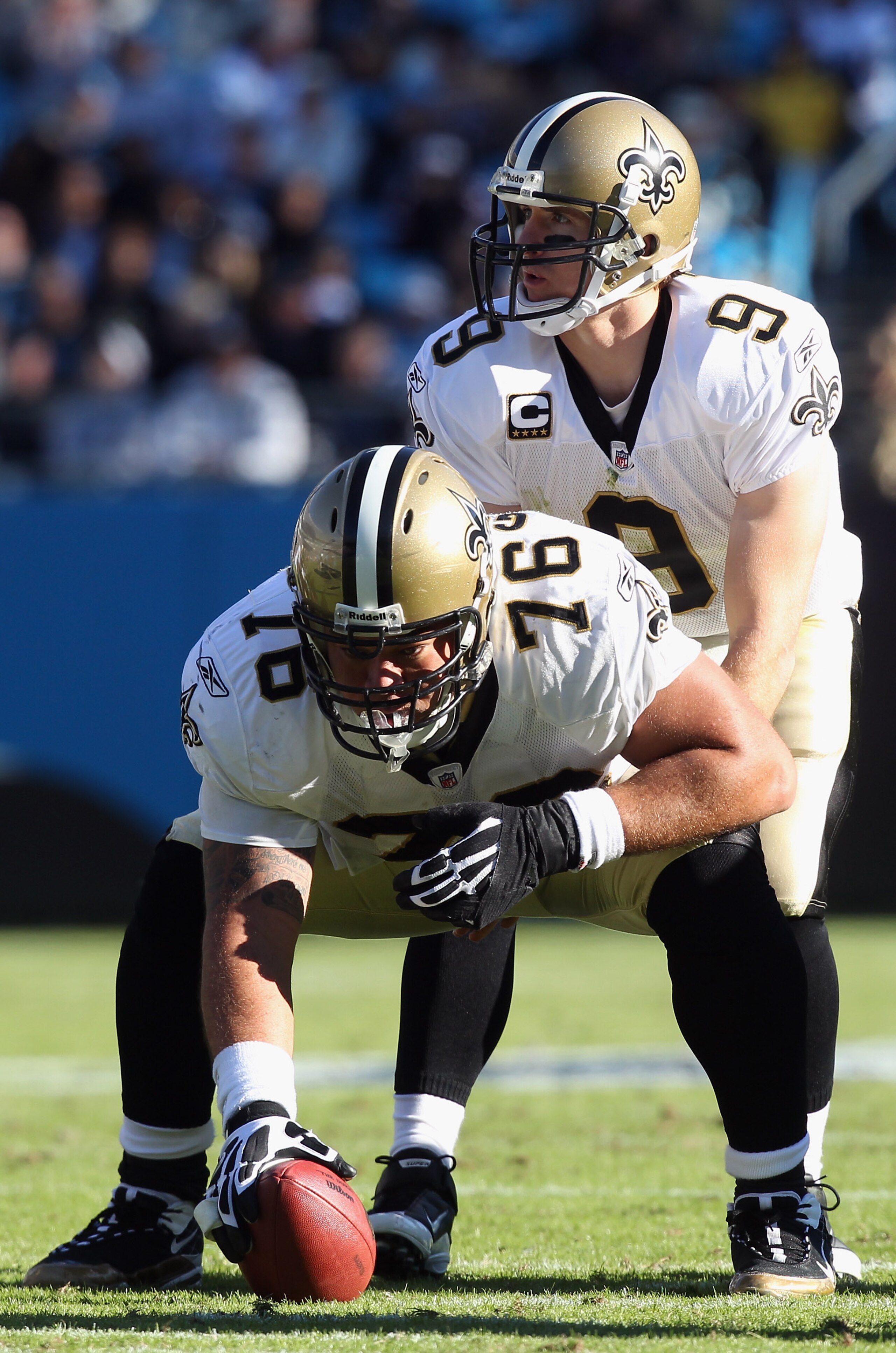 CHARLOTTE, NC - NOVEMBER 07:  Jonathan Goodwin #76 and Drew Brees #9 of the New Orleans Saints against the Carolina Panthers during their game at Bank of America Stadium on November 7, 2010 in Charlotte, North Carolina.  (Photo by Streeter Lecka/Getty Ima