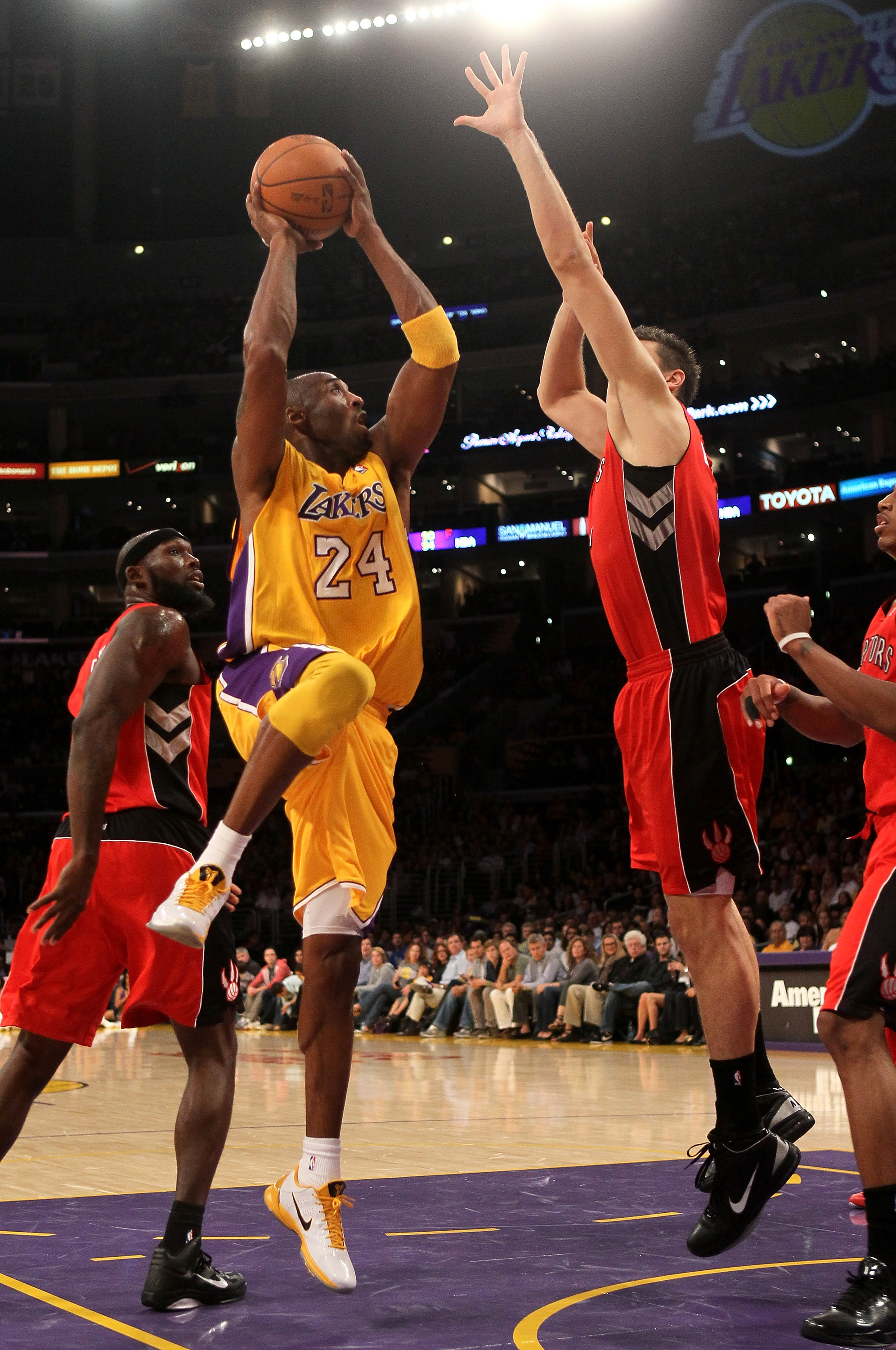 LOS ANGELES - NOVEMBER 5:  Kobe Bryant #24 of the Los Angeles Lakers goes up for a shot against Andrea Bargnani #7 of the Toronto Raptors at Staples Center on November 5, 2010 in Los Angeles, California.  The Lakers won 108-102.   NOTE TO USER: User expre