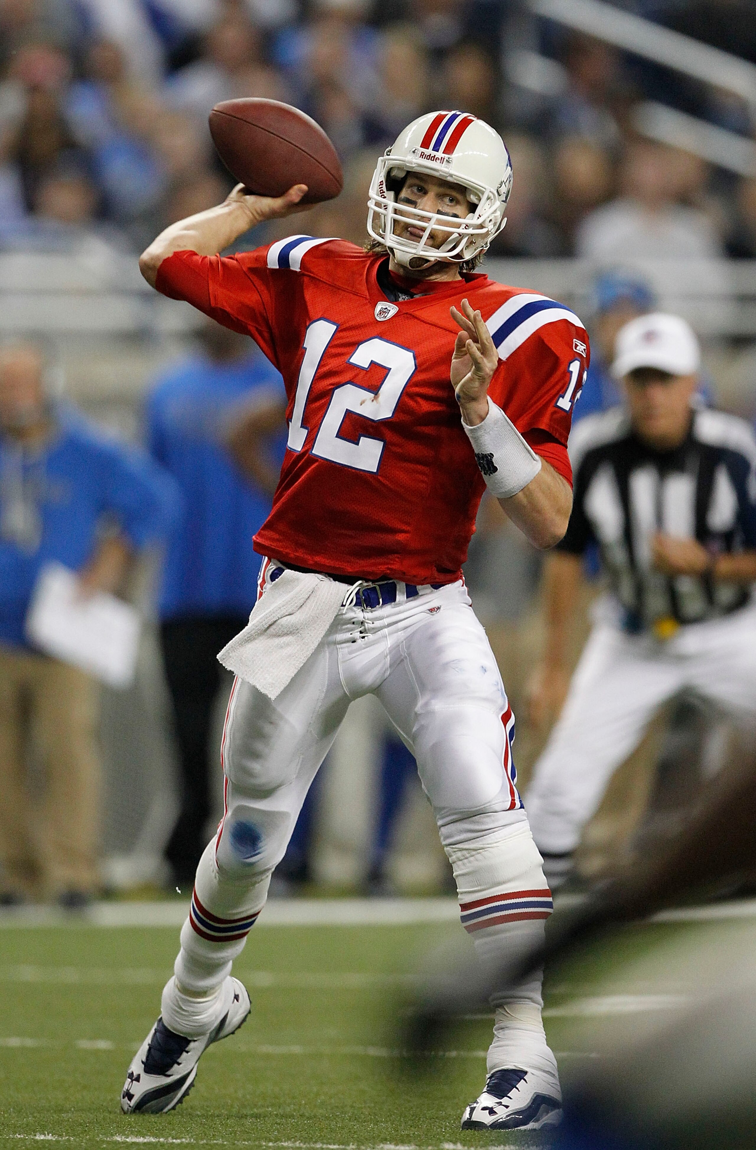 DETROIT - NOVEMBER 25:  Tom Brady #12 of the New England Patriots drops back to pass during the game against the Detroit Lions at Ford Field on November 25, 2010 in Detroit, Michigan. New England defeated Detroit 45-24.  (Photo by Leon Halip/Getty Images)