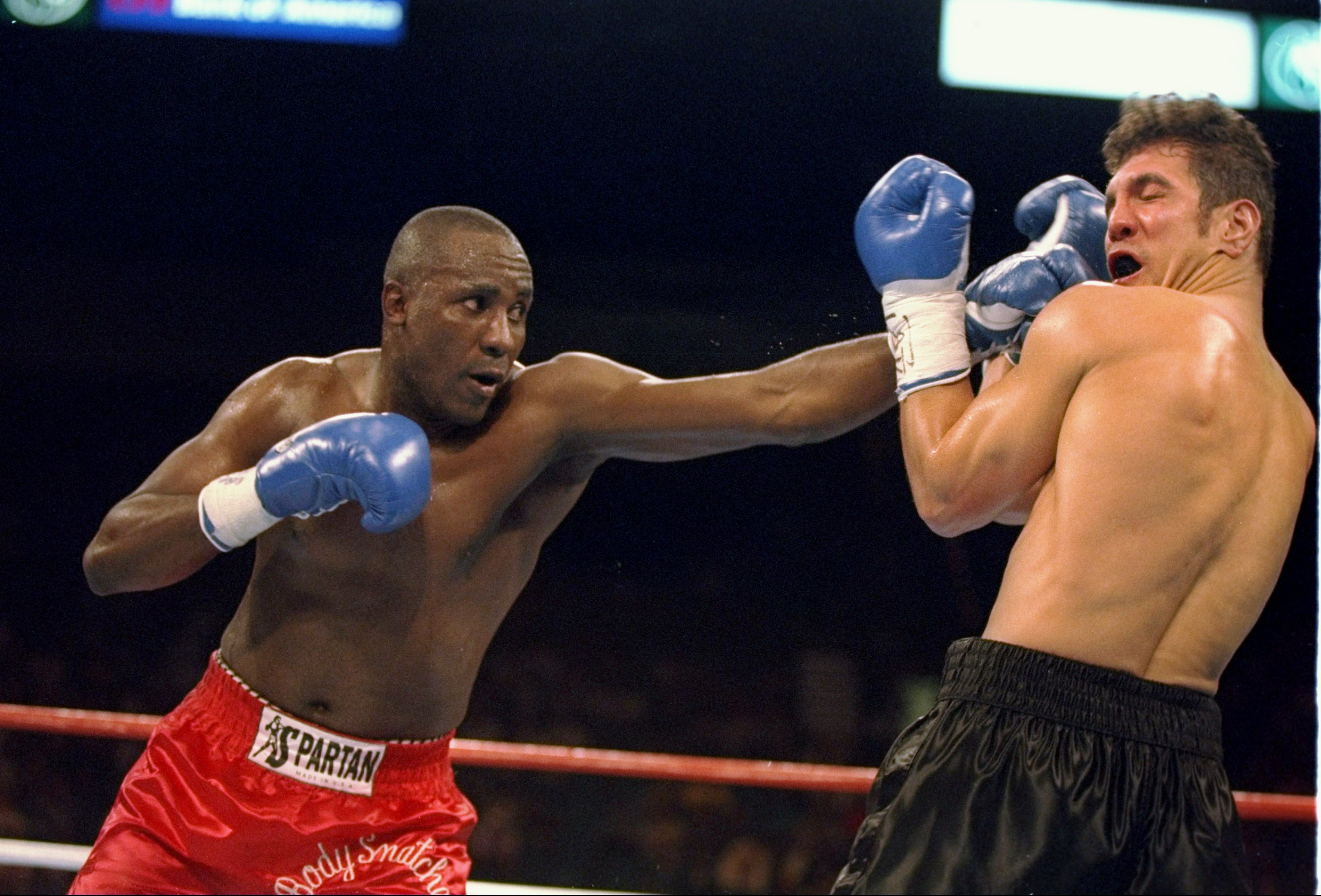 4 Mar 1994:  Mike McCallum and Randall Yonker in action during a bout in Las Vegas, Nevada.  McCallum won the fight with a TKO in the fifth round. Mandatory Credit: Al Bello  /Allsport