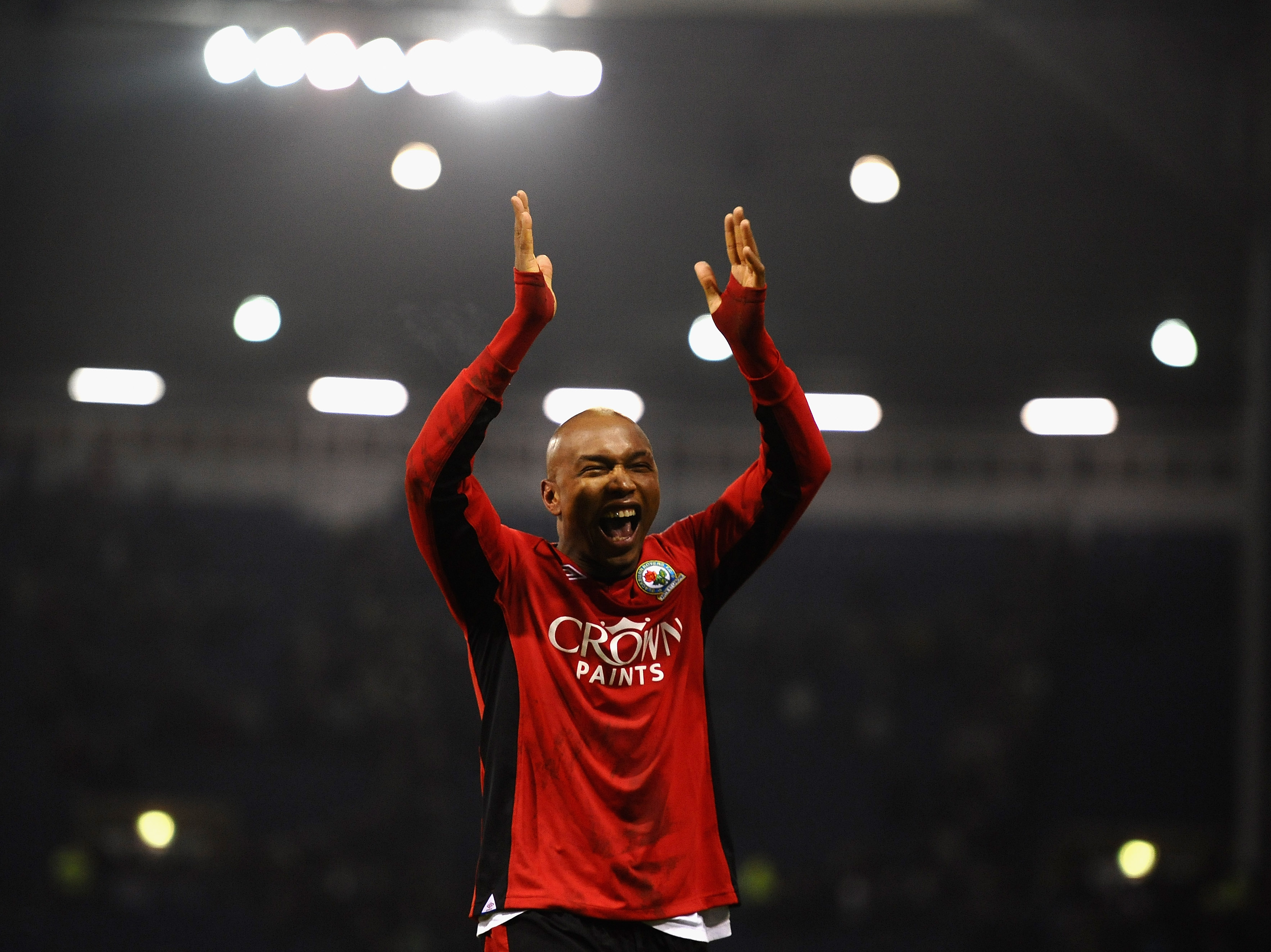 WEST BROMWICH, ENGLAND - DECEMBER 28:  El-Hadji Diouf of Blackburn Rovers celebrates an away victory during the Barclays Premier League match between West Bromwich Albion and Blackburn Rovers at The Hawthorns on December 28, 2010 in West Bromwich, England