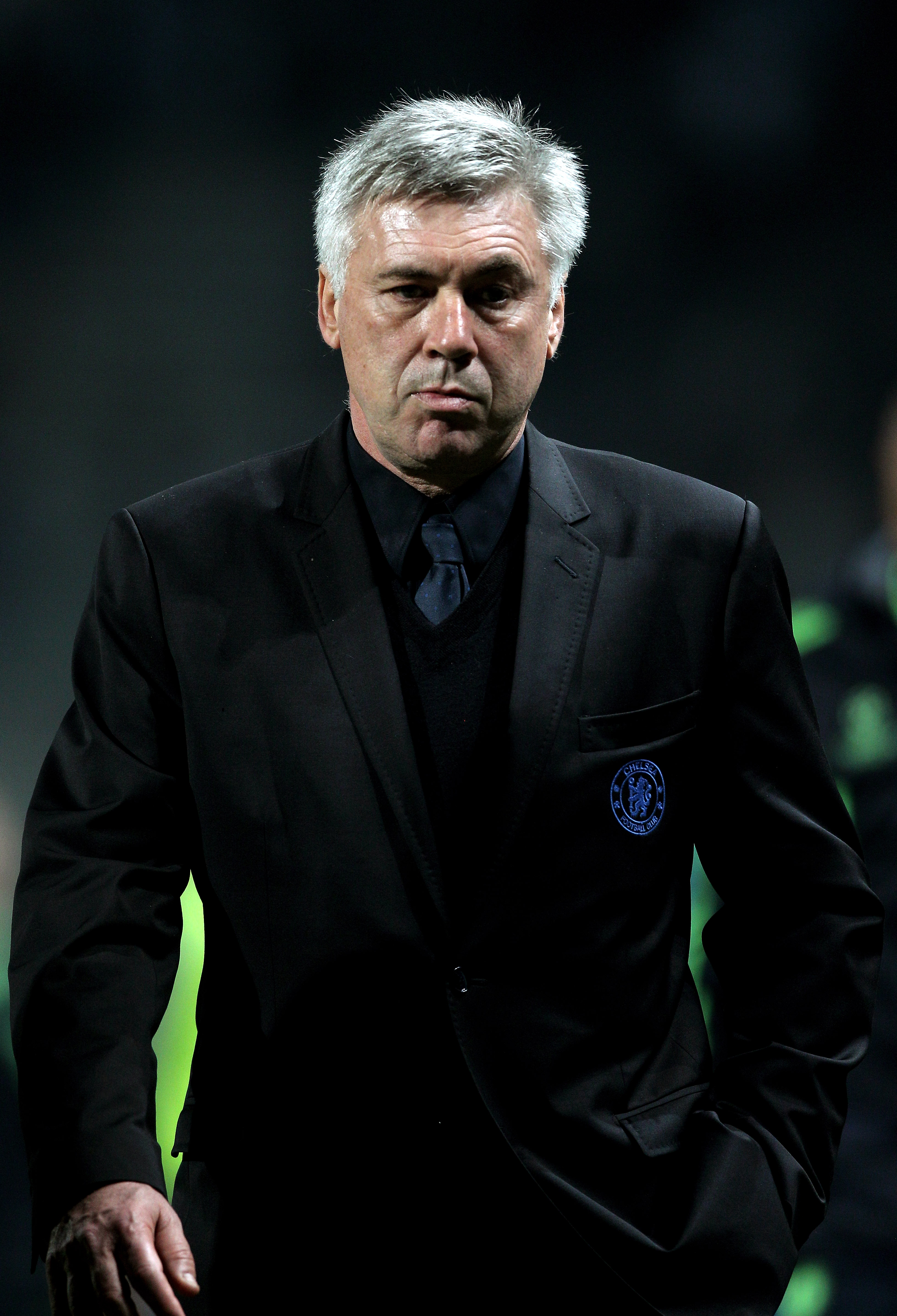 MARSEILLE, FRANCE - DECEMBER 08:  A dejected Carlo Ancelotti the Chelsea manager walks off the pitch following his team's 1-0 defeat during the UEFA Champions League Group F match between Marseille and Chelsea at the Stade Velodrome on December 8, 2010 in