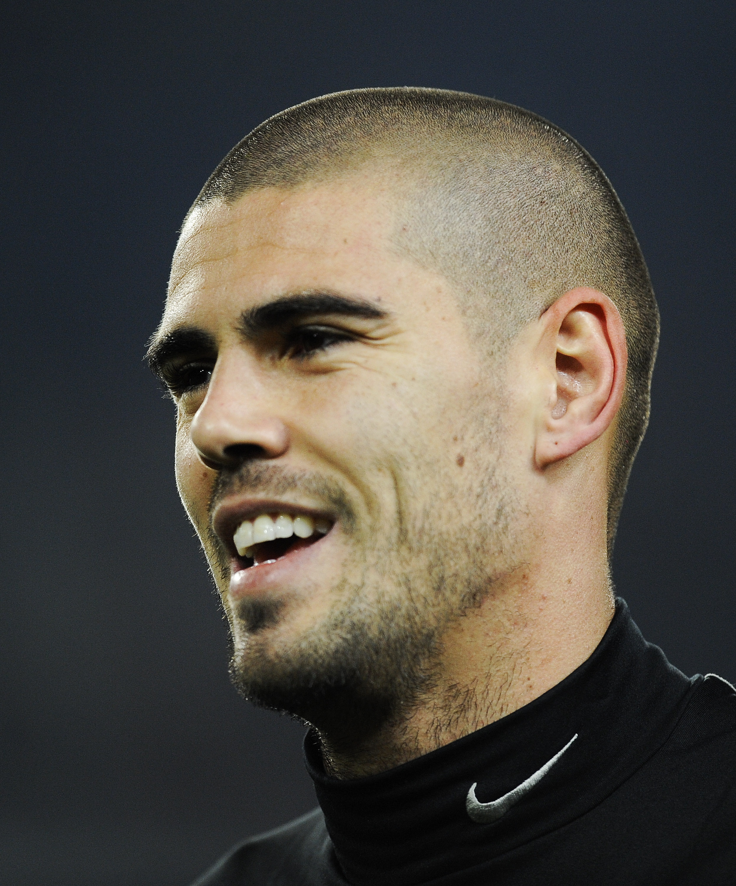 BARCELONA, SPAIN - DECEMBER 12:  Victor Valdes of Barcelona looks on during the warm up prior the La Liga match between Barcelona and Real Sociedad at Camp Nou Stadium on December 12, 2010 in Barcelona, Spain. Barcelona won the match 5-0.  (Photo by David