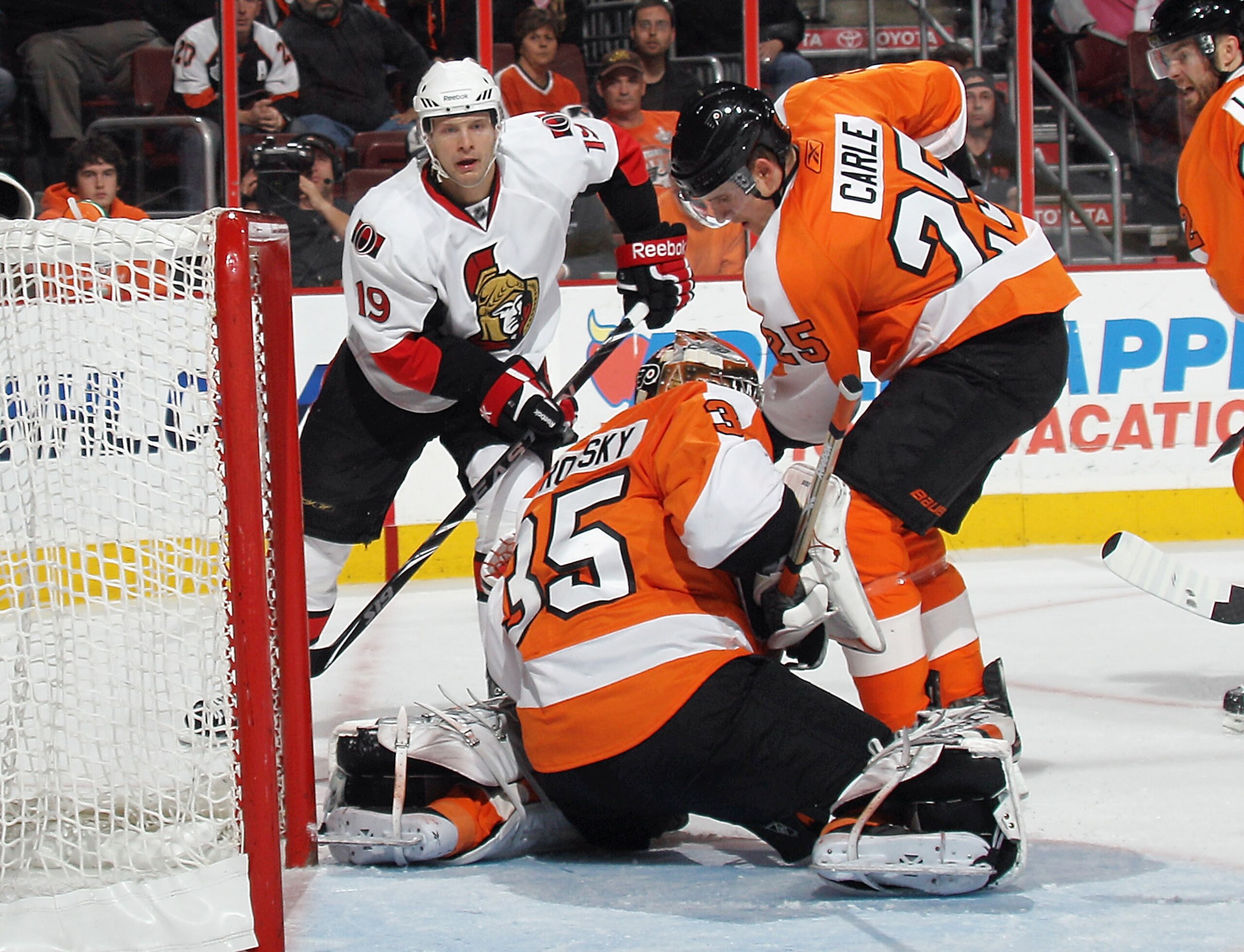 PHILADELPHIA - NOVEMBER 15: Jason Spezza #19 of the Ottawa Senators looks for a rebound from Sergei Bobrovsky #35 of the Philadelphia Flyers as defenseman Matt Carle #25 assists the defense at the Wells Fargo Center on November 15, 2010 in Philadelphia, P