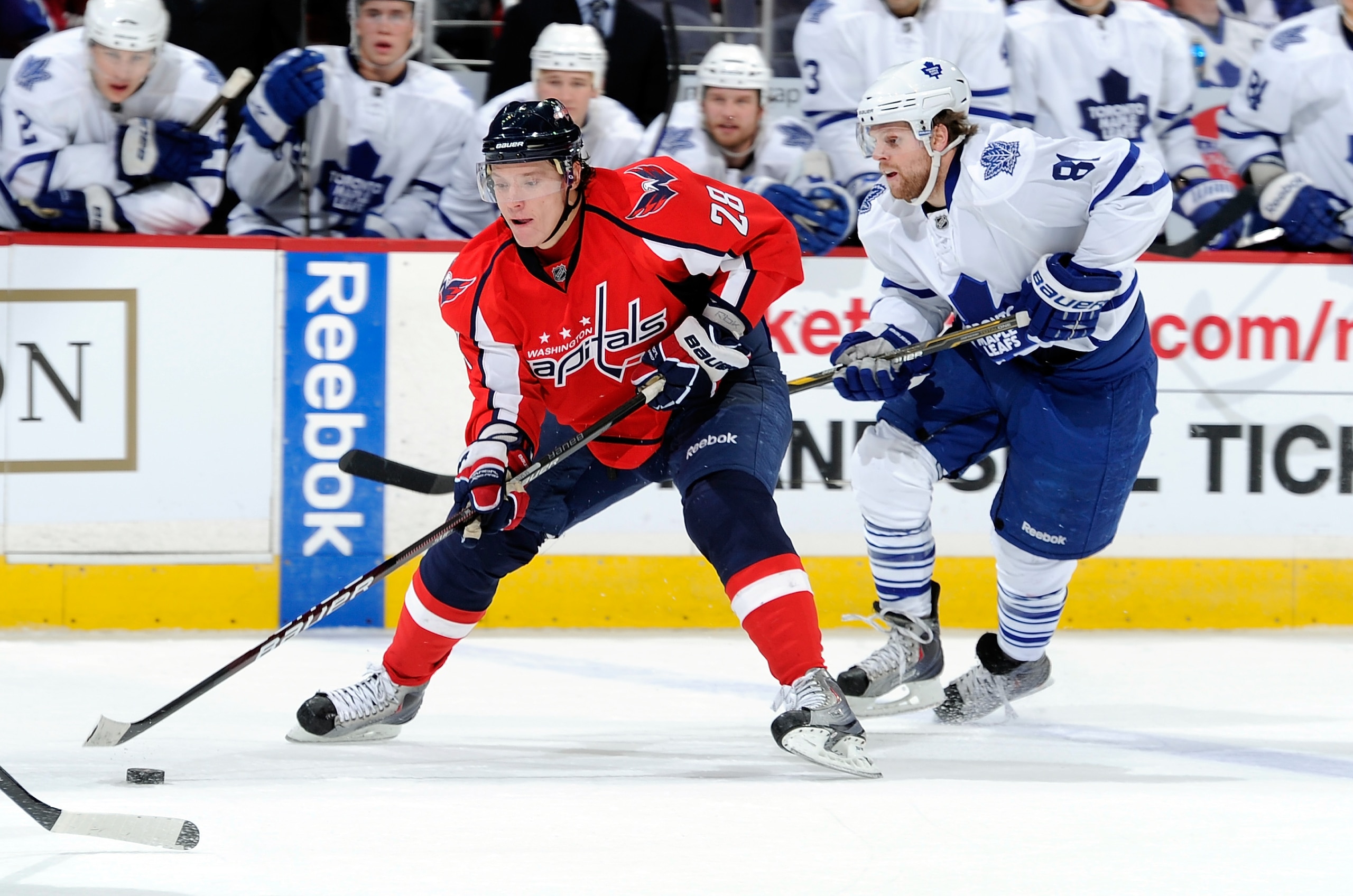 WASHINGTON, DC - DECEMBER 06:  Alexander Semin #28 of the Washington Capitals handles the puck against Phil Kessel #81 of the Toronto Maple Leafs at the Verizon Center on December 6, 2010 in Washington, DC.  (Photo by Greg Fiume/Getty Images)