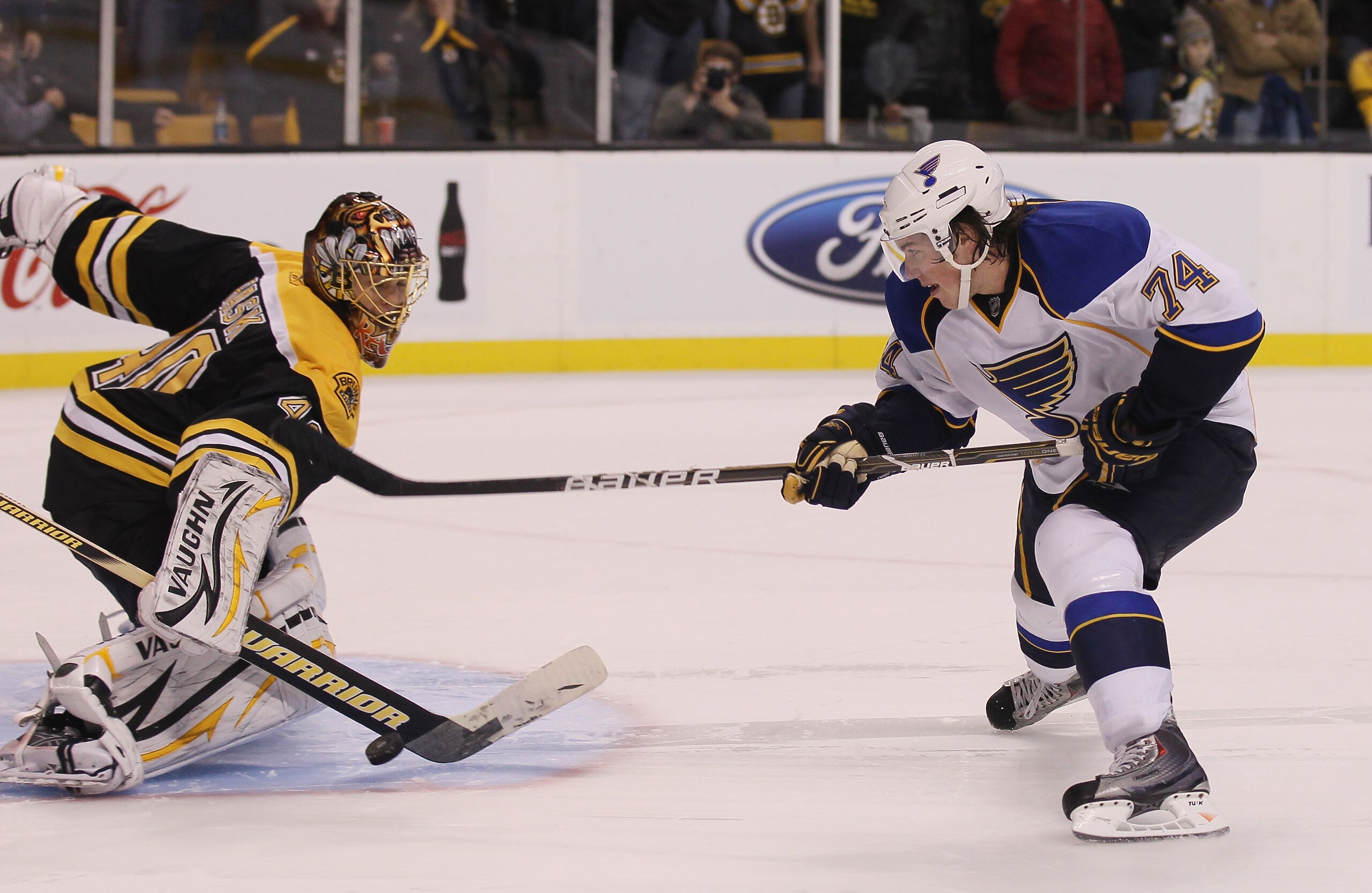 BOSTON - NOVEMBER 06:  TJ Oshie #74 of the St. Louis Blues gets a shot past Tuukka Rask #40 of the Boston Bruins during the shootout on November 6, 2010 at the TD Garden in Boston, Massachusetts. The Blues defeated the Bruins 2-1 in an overtime shootout.