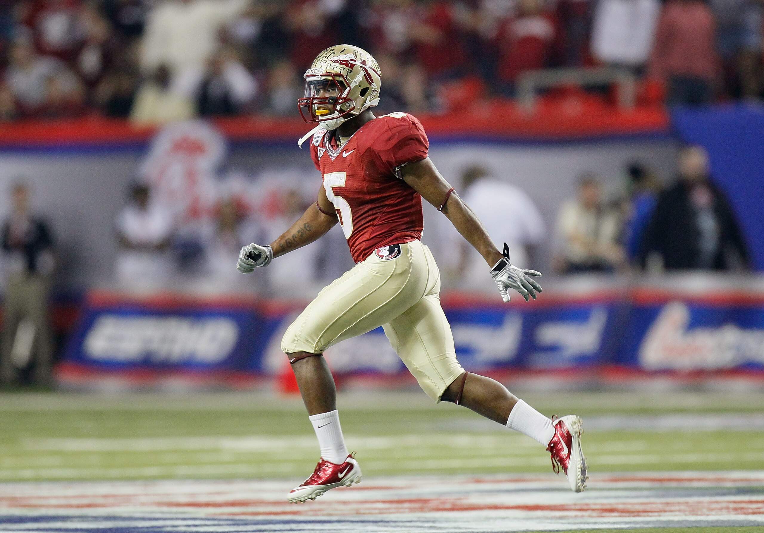 ATLANTA, GA - DECEMBER 31:  Greg Reid #5 of the Florida State Seminoles reacts after returning an interception against the South Carolina Gamecocks during the 2010 Chick-fil-A Bowl at Georgia Dome on December 31, 2010 in Atlanta, Georgia.  (Photo by Kevin