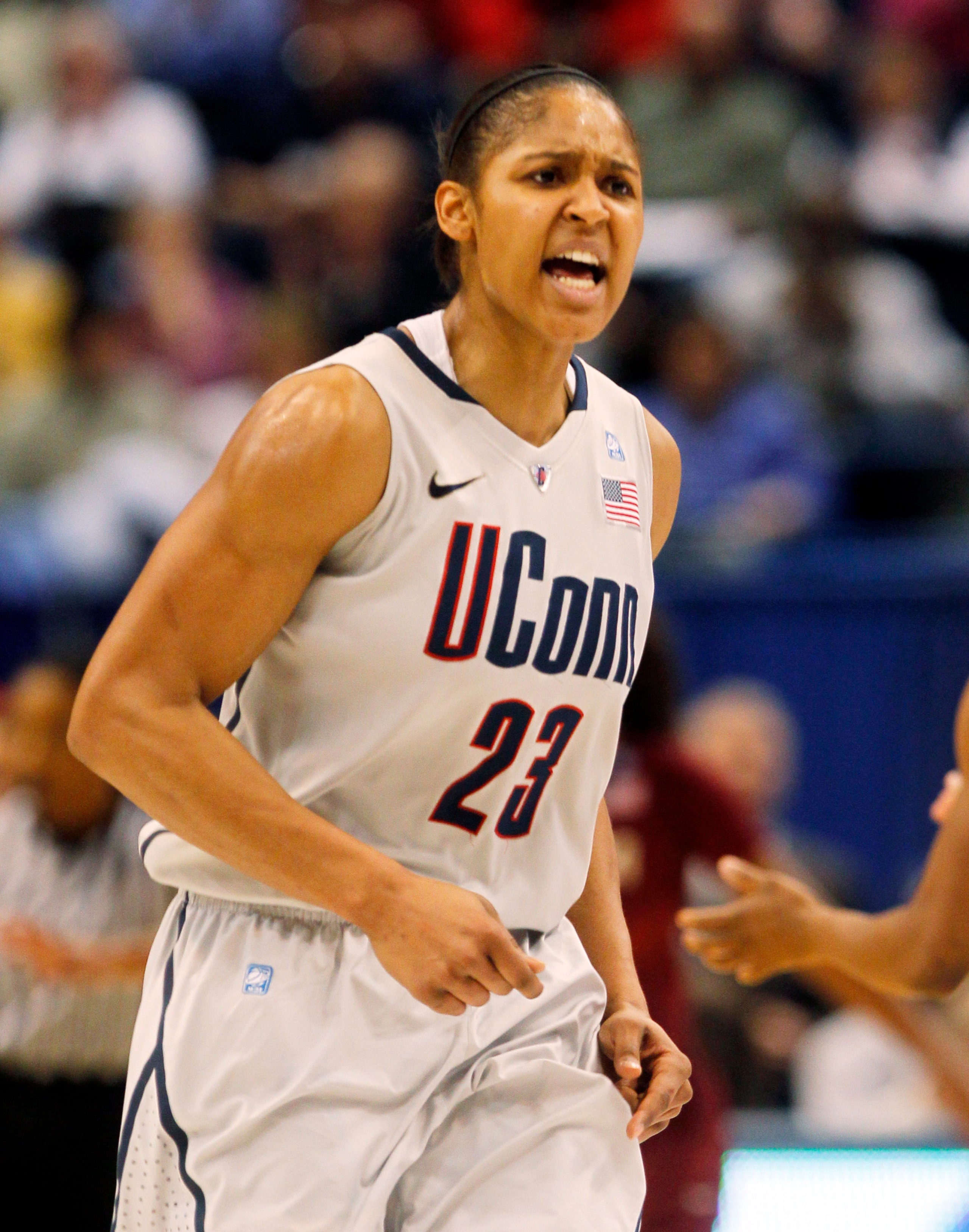HARTFORD, CT - DECEMBER 21:  Maya Moore #23 of the Connecticut reacts in the final minutes of a win over Florida State on December 21, 2010 in Hartford, Connecticut.  Connecticut set a record with 89 straight wins without a defeat. (Photo by Jim Rogash/Ge