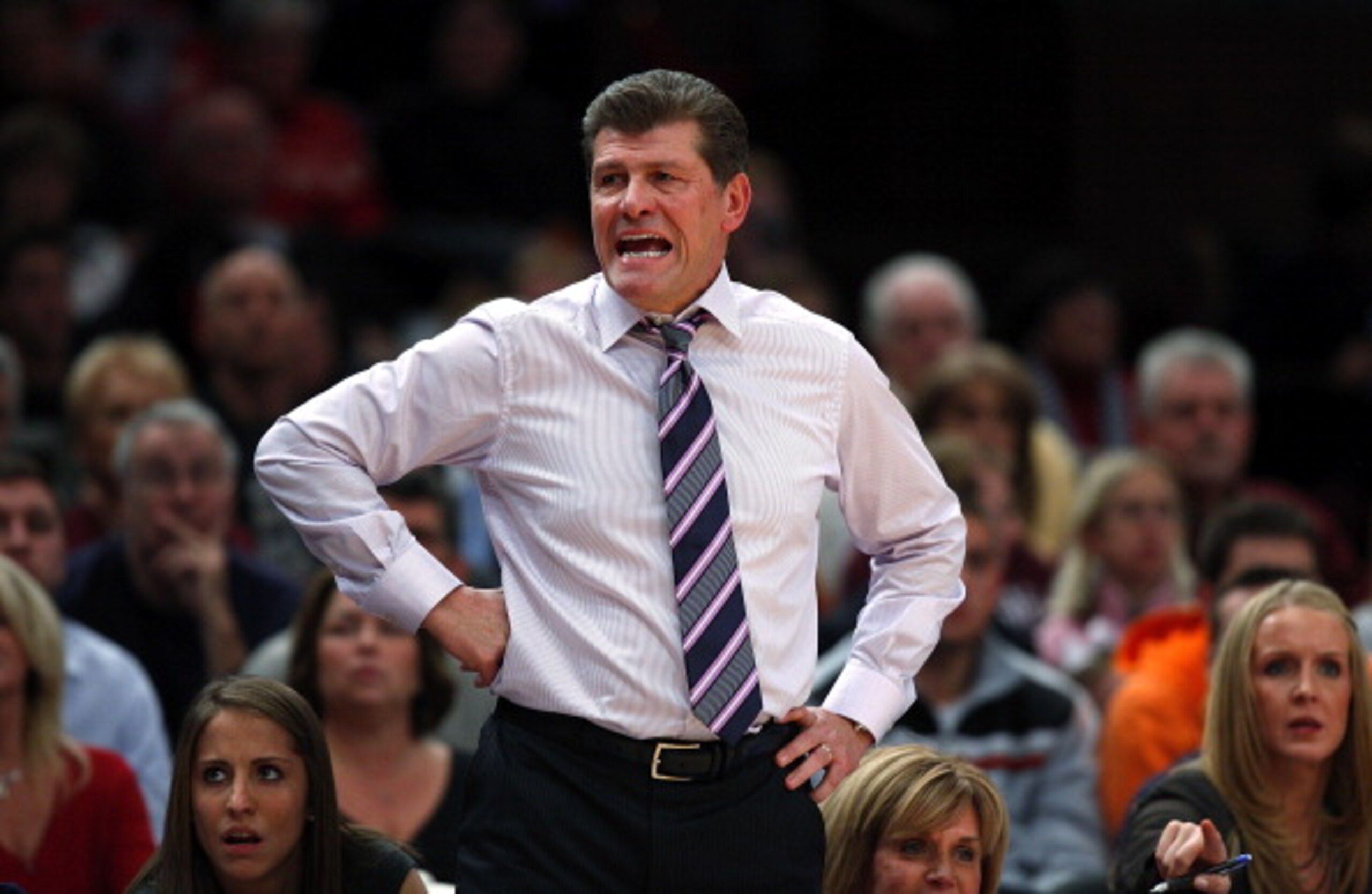 NEW YORK, NY - DECEMBER 19:  Geno Auriemma, head coach of the Connecticut Huskies works the bench against the Ohio State Buckeyes in the Maggie Dixon Classic at Madison Square Garden on December 19, 2010 in New York City.  (Photo by Jeff Zelevansky/Getty