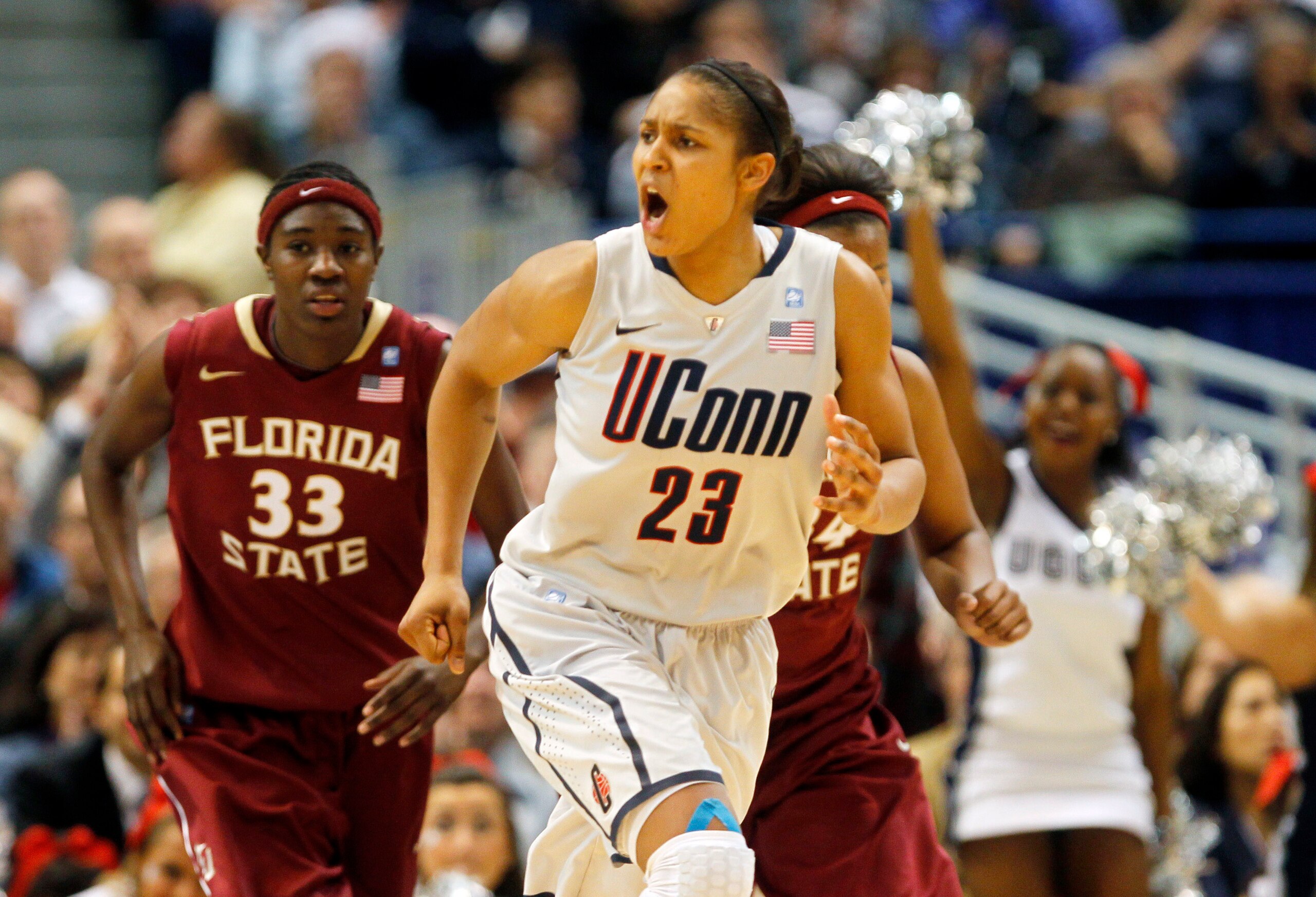 HARTFORD, CT - DECEMBER 21:  Maya Moore #23 of the Connecticut reacts in the final minutes of a win over Florida State on December 21, 2010 in Hartford, Connecticut.  Connecticut set a record with 89 straight wins without a defeat. (Photo by Jim Rogash/Ge