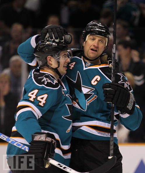 The Sharks celebrate evening the series with Colorado at one game apiece.