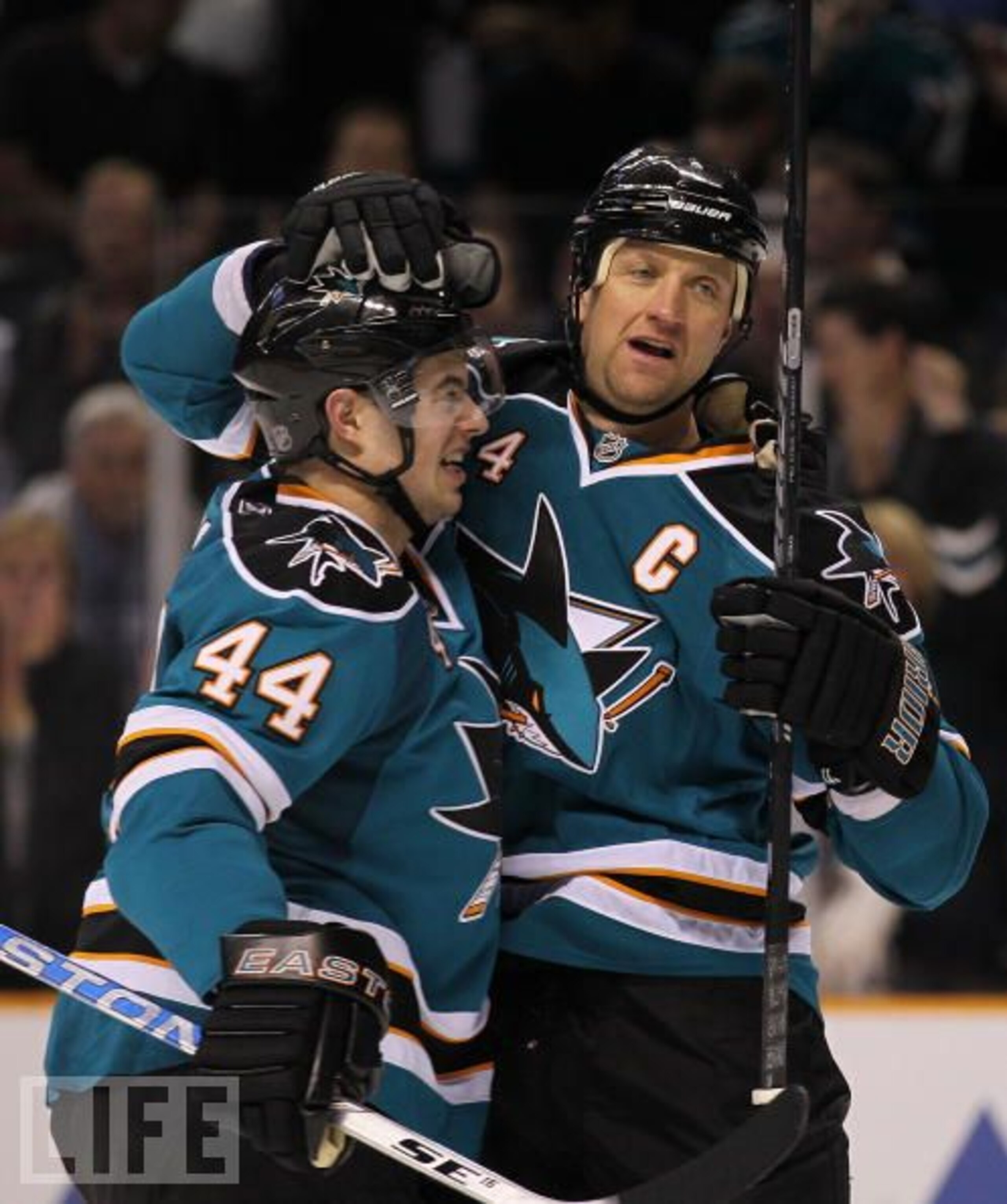 The Sharks celebrate evening the series with Colorado at one game apiece.
