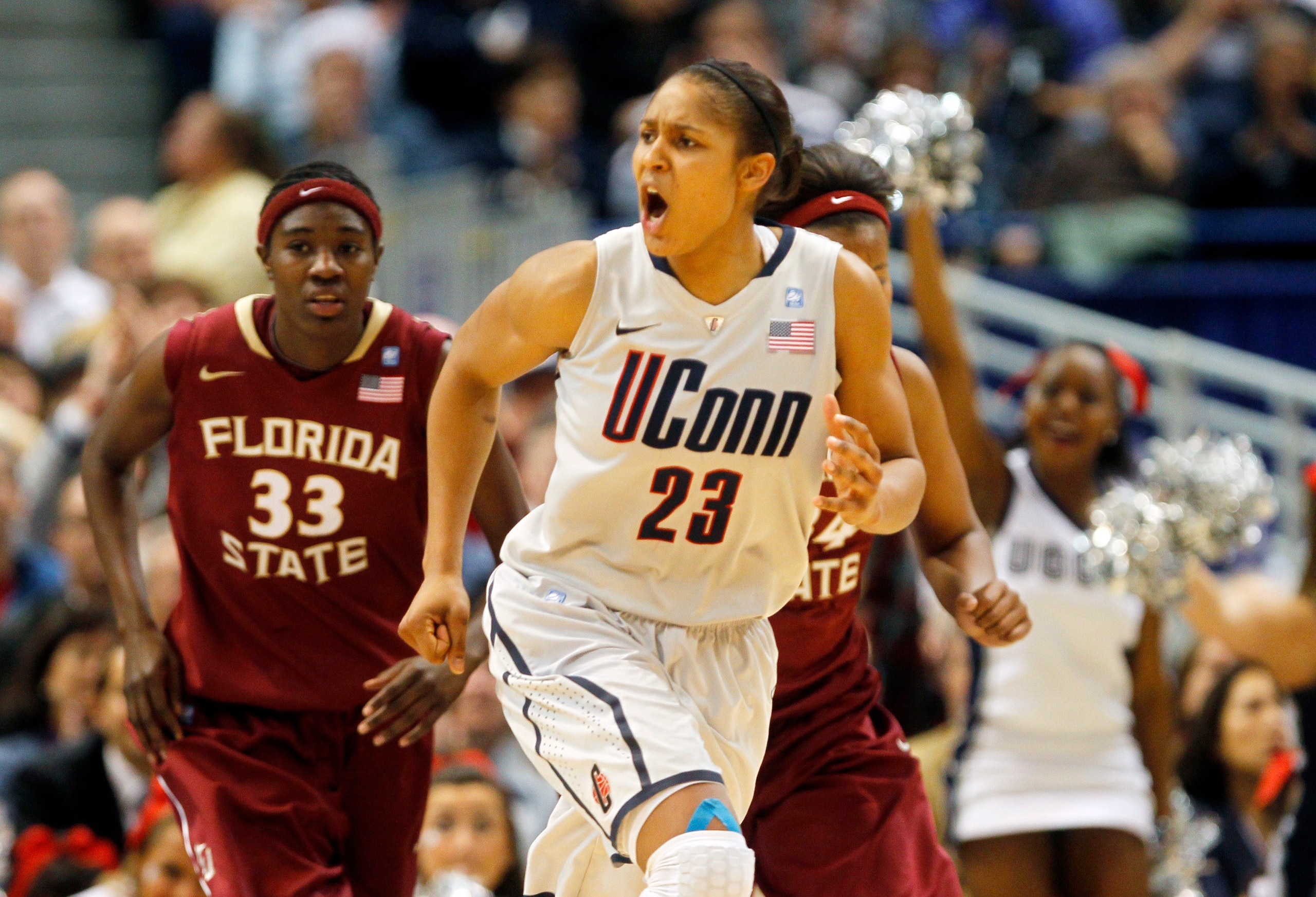 HARTFORD, CT - DECEMBER 21:  Maya Moore #23 of the Connecticut reacts in the final minutes of a win over Florida State on December 21, 2010 in Hartford, Connecticut.  Connecticut set a record with 89 straight wins without a defeat. (Photo by Jim Rogash/Ge