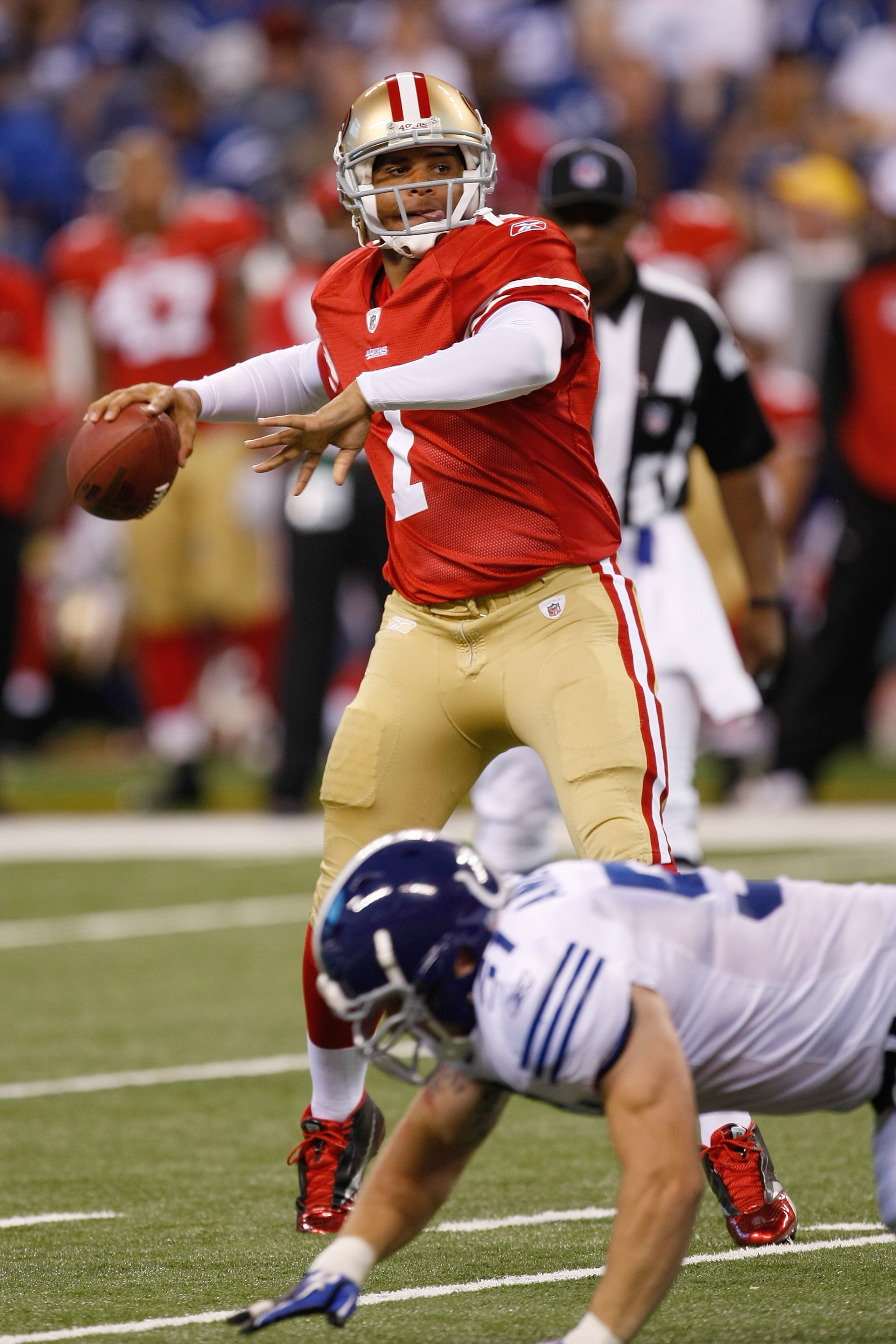 INDIANAPOLIS, IN - AUGUST 15: Nate Davis #7 of the San Francisco 49ers looks to pass during the preseason game against the Indianapolis Colts at Lucas Oil Stadium on August 15, 2010 in Indianapolis, Indiana. The 49ers defeated the Colts 37-17. (Photo by S