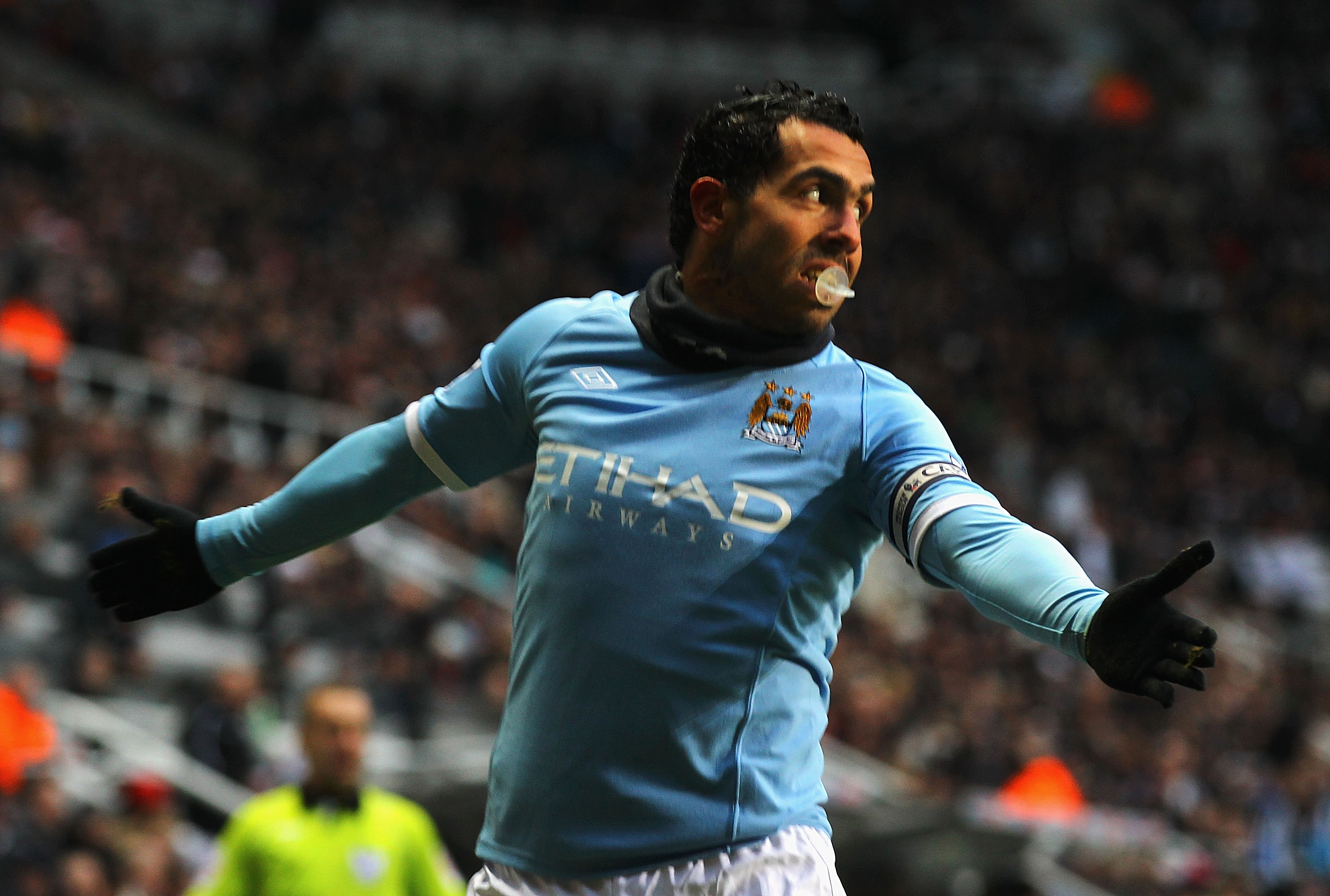 NEWCASTLE UPON TYNE, ENGLAND - DECEMBER 26:  Carlos Tevez of Manchester City celebrates his goal during the Barclays Premier League match between Newcastle United and Manchester City at St James' Park on December 26, 2010 in Newcastle upon Tyne, England.