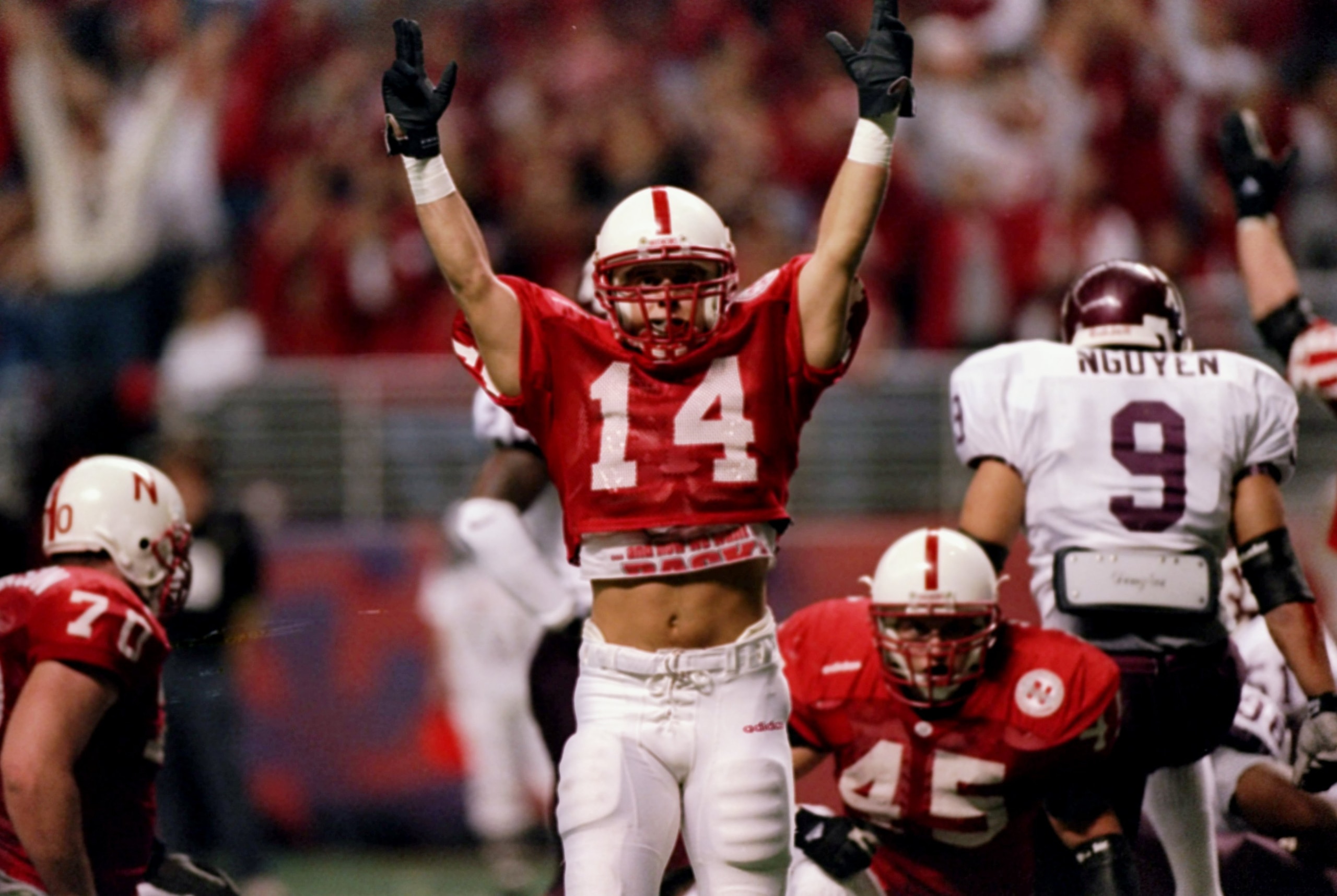 6 Dec 1997:  Running back Lance Brown of the Nebraska Cornhuskers celebrates during a game against the Texas A&M Aggies at the Alamodome in San Antonio, Texas.  Nebraska won the game 54-15. Mandatory Credit: Stephen Dunn  /Allsport