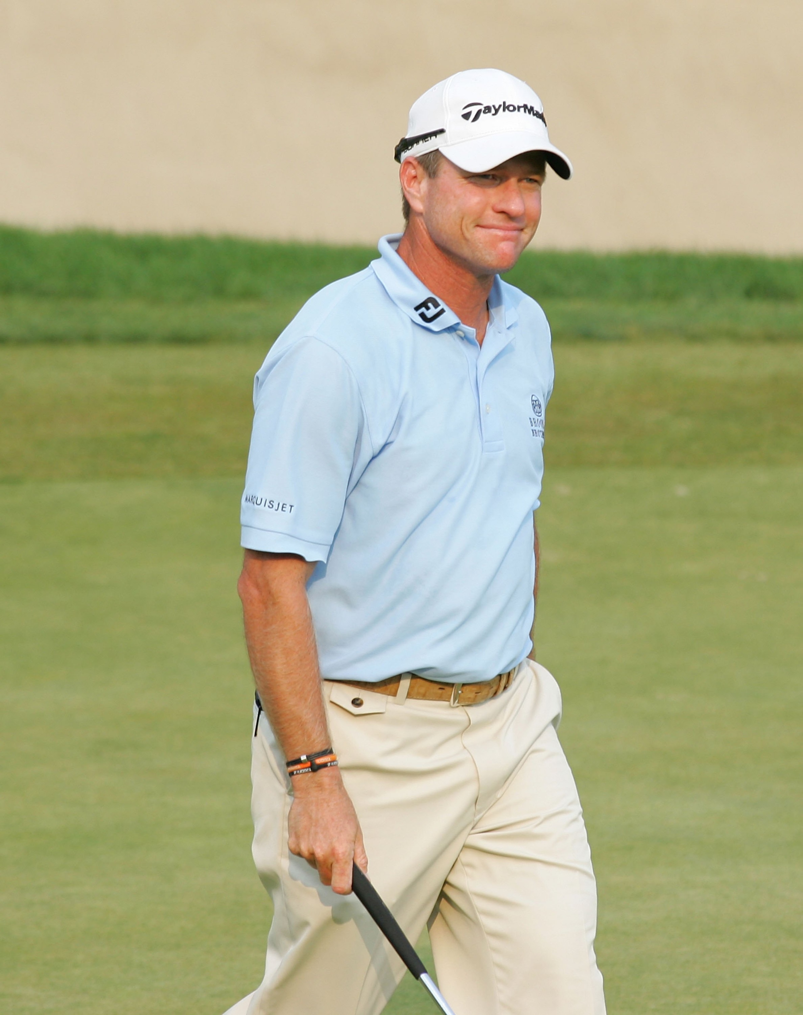 CROMWELL, CT - JUNE 27:  Scott Verplank reacts as he makes a birdie on the 18th green to continue during the playoff following the final round of the Travelers Championship held at TPC River Highlands on June 27, 2010 in Cromwell, Connecticut.  (Photo by
