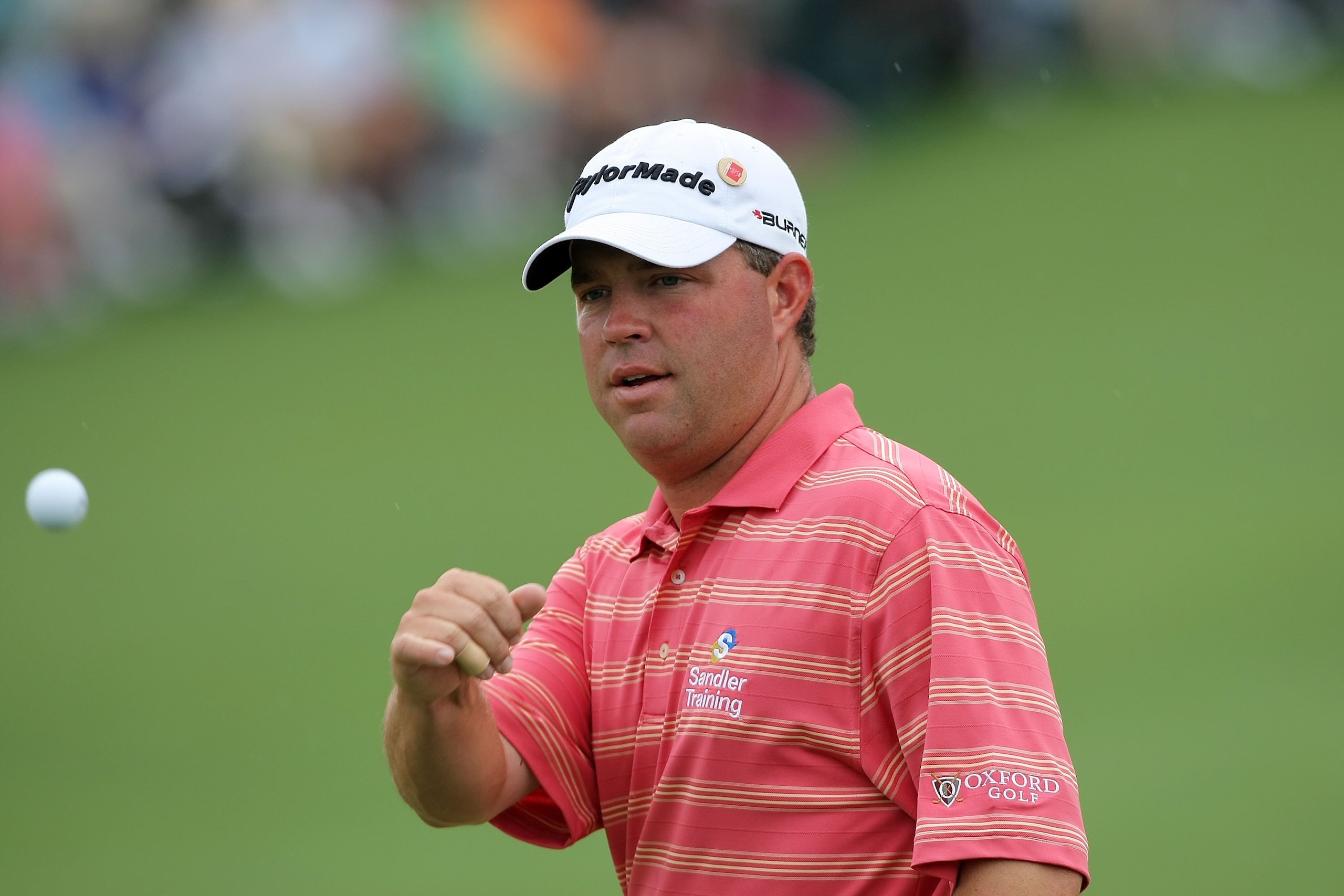 AUGUSTA, GA - APRIL 12:  Brian Bateman tosses the ball to the crowd after making par on the second hole during the third round of the 2008 Masters Tournament at Augusta National Golf Club on April 12, 2008 in Augusta, Georgia.  (Photo by Harry How/Getty I