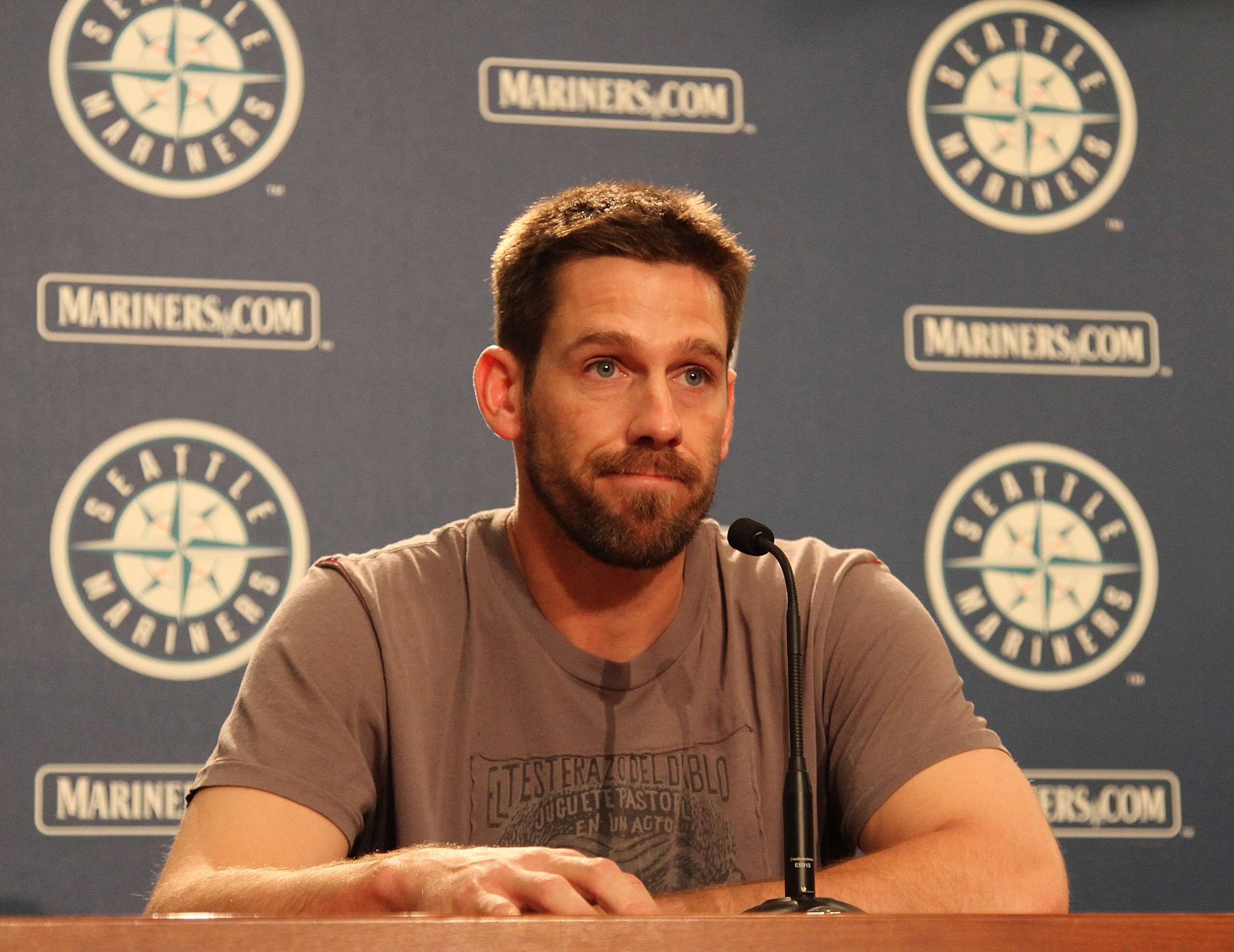 SEATTLE - JULY 09:  Cliff Lee of the Seattle Mariners speaks at a press conference announcing his trade to the Texas Rangers for first baseman Justin Smoak, pitcher Blake Beavan, Double-A Frisco reliever Josh Lueke and second baseman Matt Lawson at Safeco