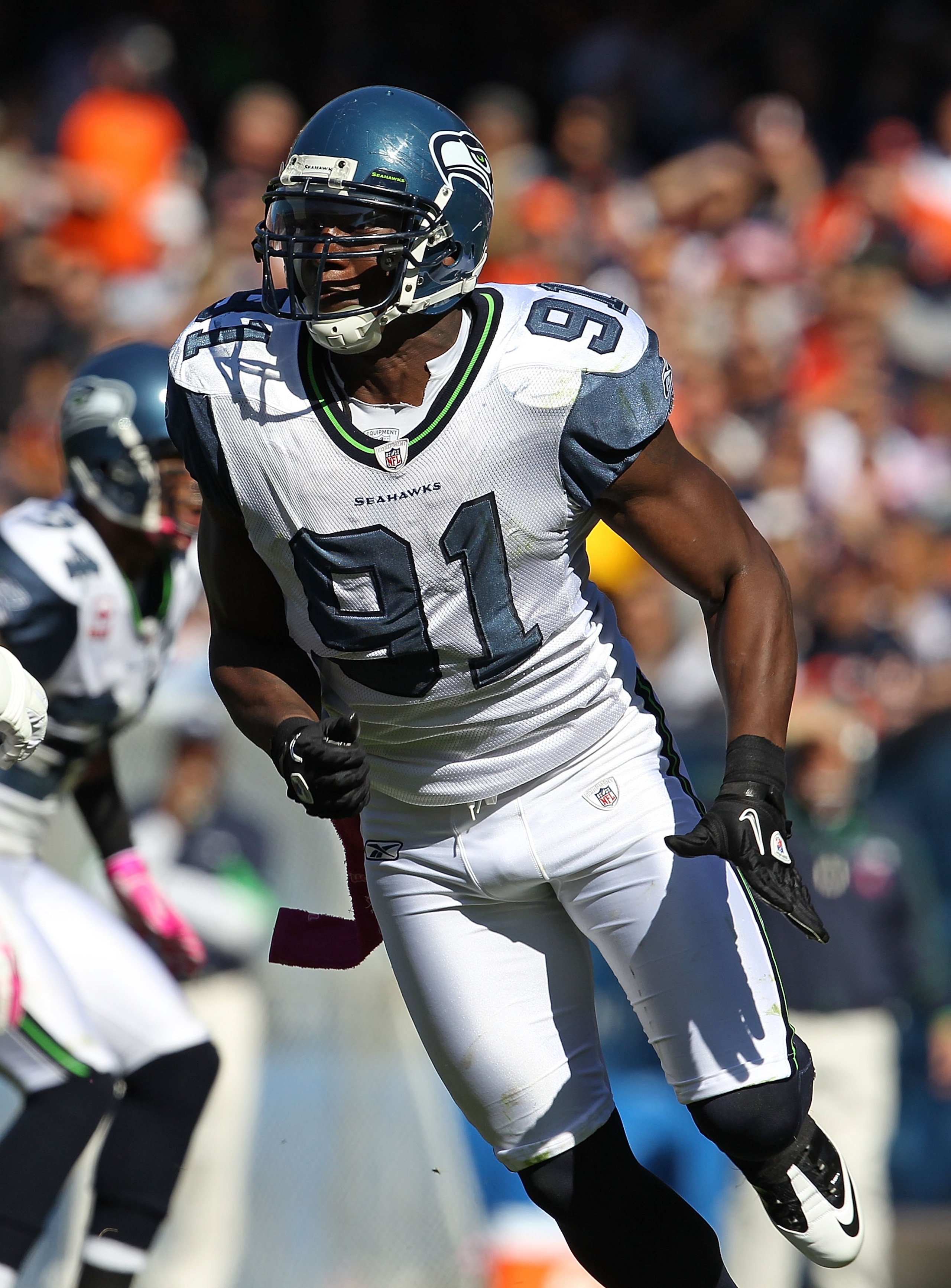 CHICAGO - OCTOBER 17: Chris Clemons #91 of the Seattle Seahawks rushes against the Chicago Bears at Soldier Field on October 17, 2010 in Chicago, Illinois. The Seahawks defeated the Bears 23-20.  (Photo by Jonathan Daniel/Getty Images)