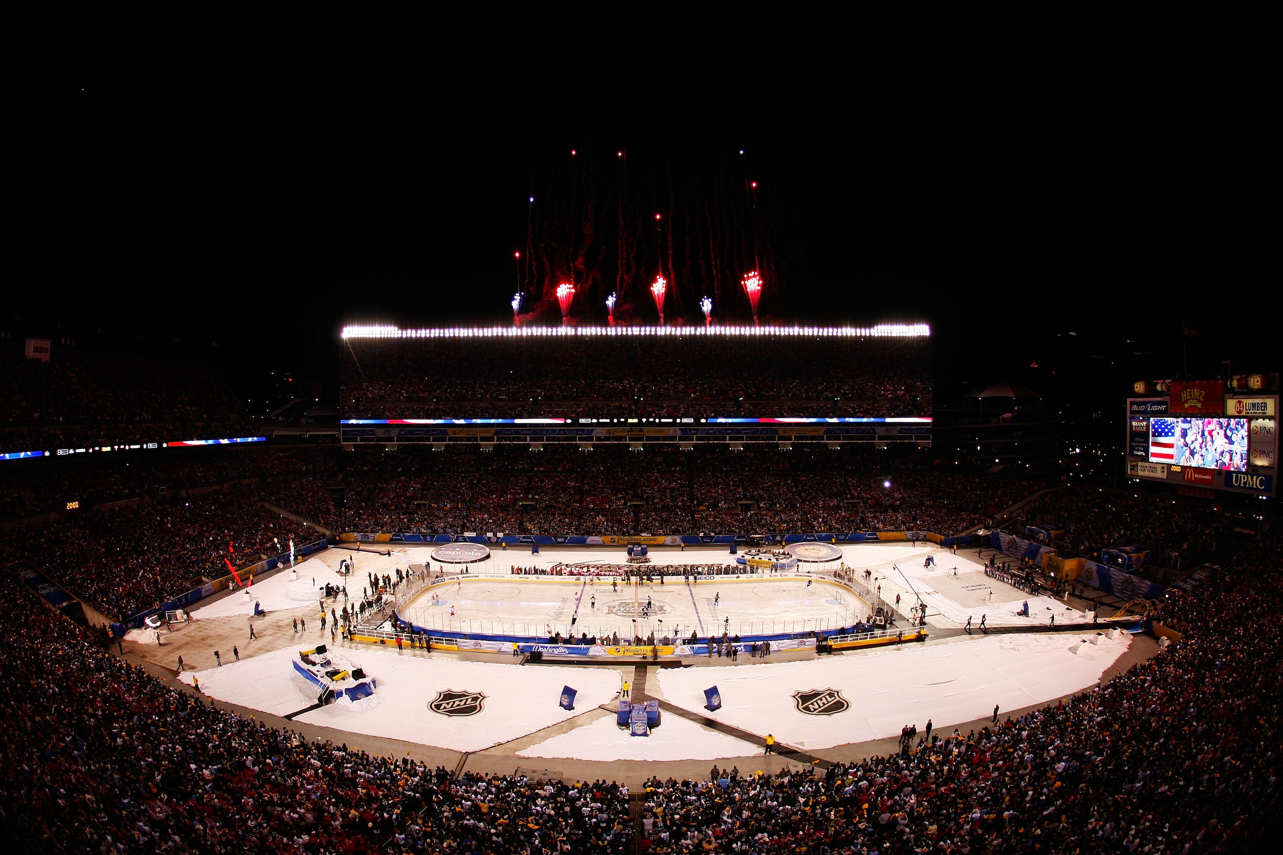 PITTSBURGH, PA - JANUARY 01:  Fireworks go off before the start of the 2011 NHL Bridgestone Winter Classic between the Pittsburgh Penguins and the Washington Capitals at Heinz Field on January 1, 2011 in Pittsburgh, Pennsylvania.  (Photo by Justin K. Alle