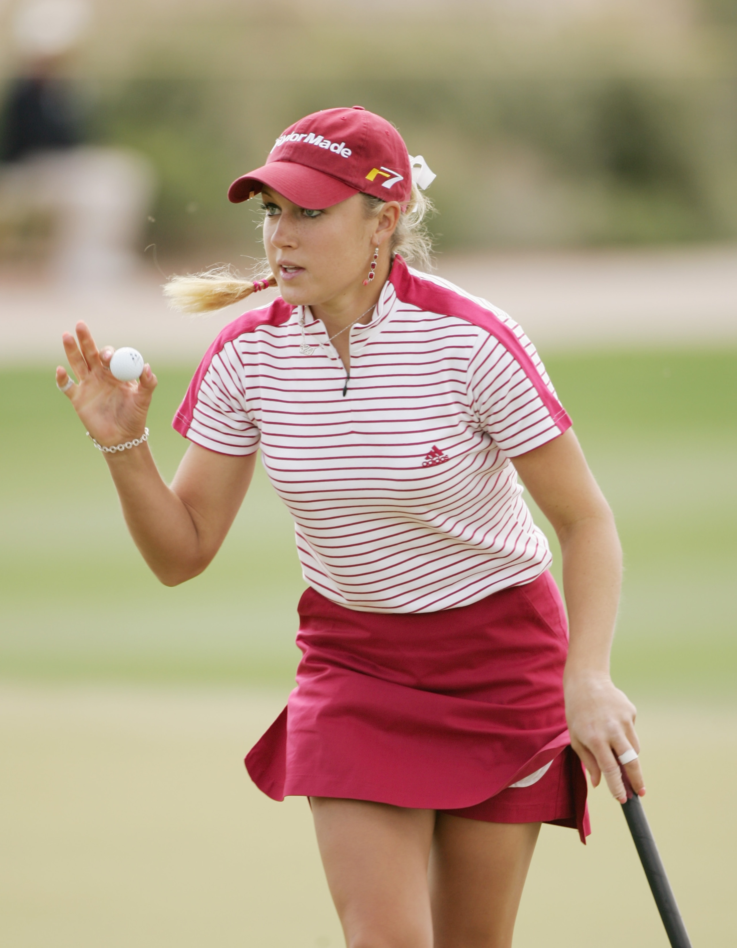 SUPERSTITION MOUNTAIN, AZ - MARCH 20:  Natalie Gulbis waves to the gallery during the final round of the Safeway International at Superstition Mountain Golf and Country Club on March 20, 2005 in Superstition Mountain, Arizona.  (Photo by Scott Halleran/Ge