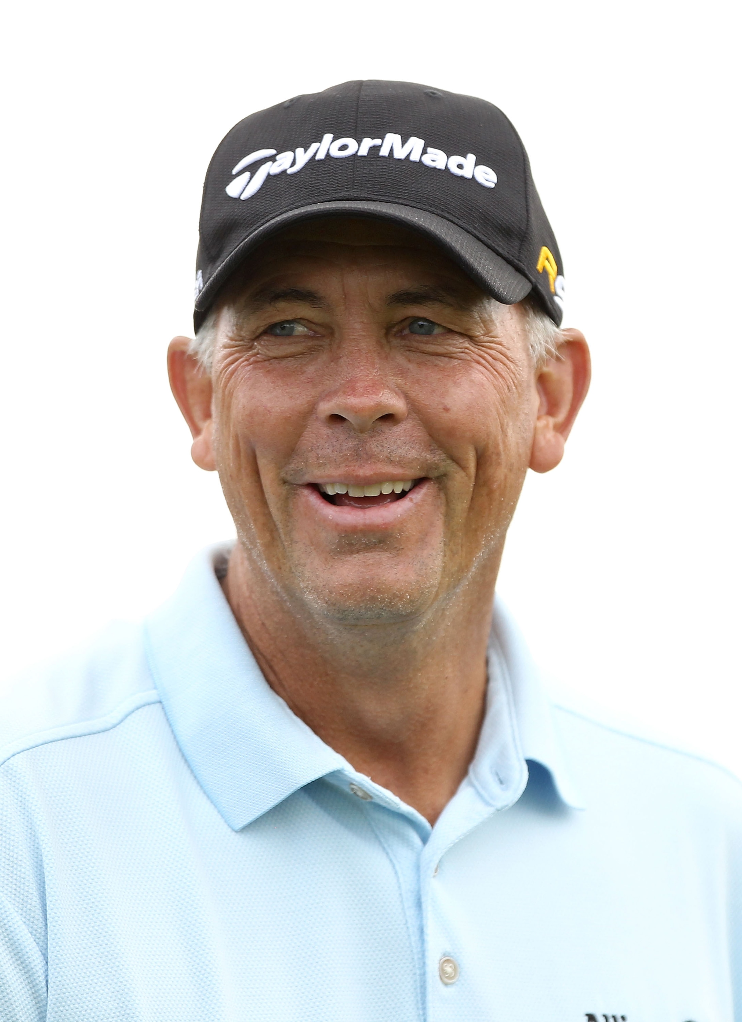 SAN FRANCISCO - NOVEMBER 05:  Tom Lehman smiles after he tees off on the 14th hole during round 2 of the Charles Schwab Cup Championship at Harding Park Golf Course on November 5, 2010 in San Francisco, California.  (Photo by Ezra Shaw/Getty Images)