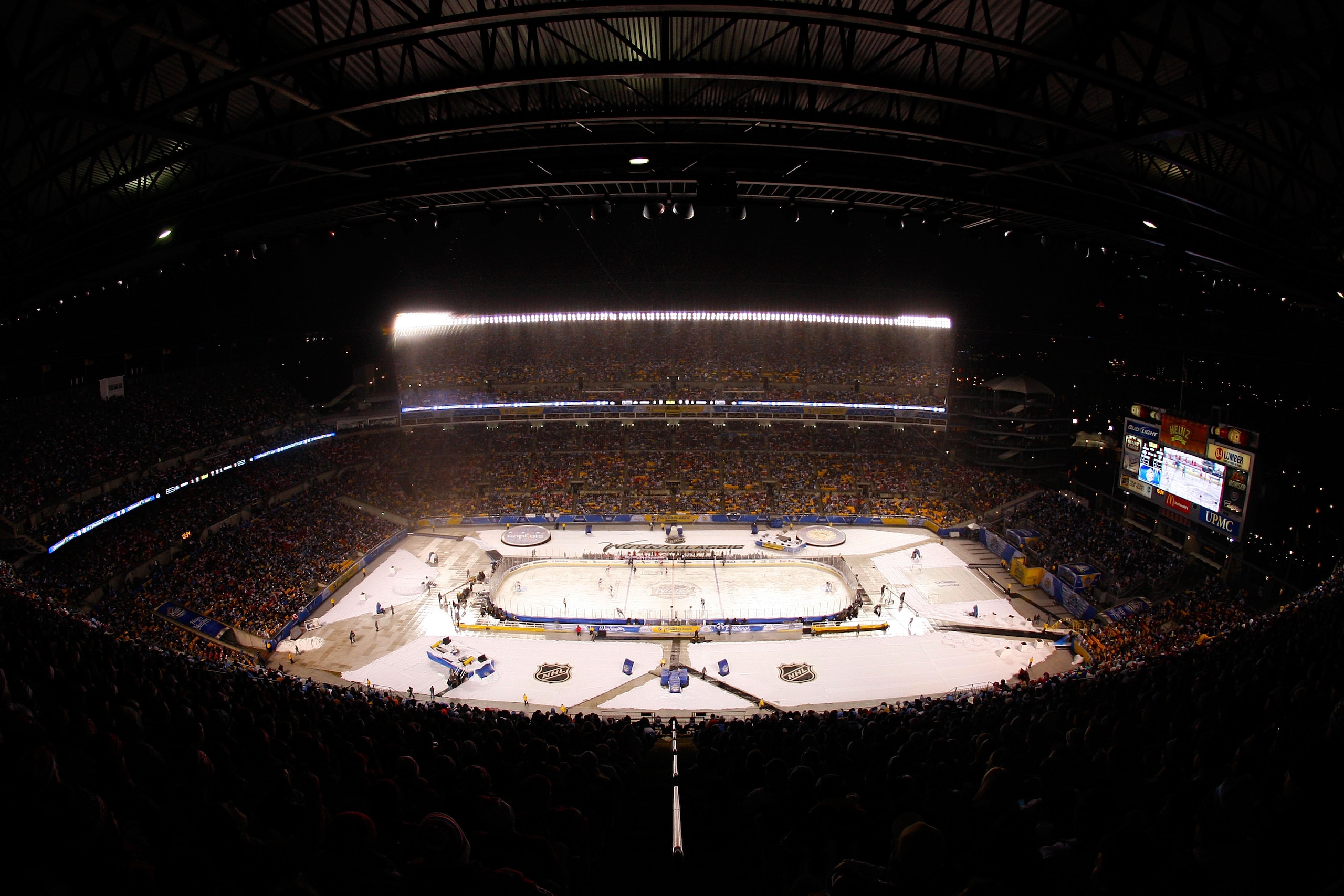 PITTSBURGH, PA - JANUARY 01: A general view is seen as the Pittsburgh Penguins take on the Washington Capitals during the 2011 NHL Bridgestone Winter Classic at Heinz Field on January 1, 2011 in Pittsburgh, Pennsylvania. (Photo by Justin K. Aller/Getty PITTSBURGH, PA - JANUARY 01: A general view is seen as the Pittsburgh Penguins take on the Washington Capitals during the 2011 NHL Bridgestone Winter Classic at Heinz Field on January 1, 2011 in Pittsburgh, Pennsylvania. (Photo by Justin K. Aller/Getty