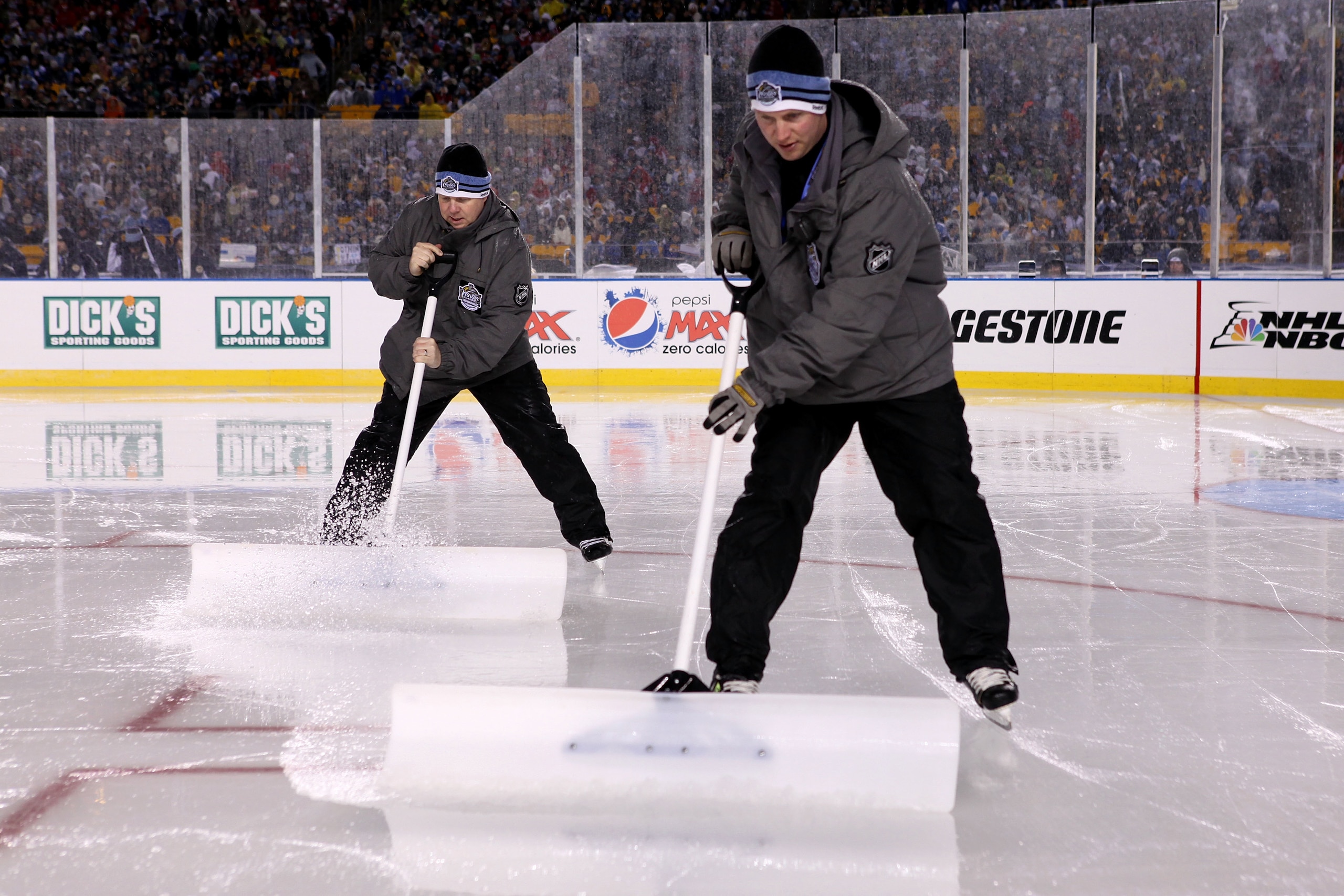 PITTSBURGH, PA - JANUARY 01: Members of the ice crew maintain the ice during the 2011 NHL Bridgestone Winter Classic between the Washington Capitals and the Pittsburgh Penguins at Heinz Field on January 1, 2011 in Pittsburgh, Pennsylvania. (Photo by Jam PITTSBURGH, PA - JANUARY 01: Members of the ice crew maintain the ice during the 2011 NHL Bridgestone Winter Classic between the Washington Capitals and the Pittsburgh Penguins at Heinz Field on January 1, 2011 in Pittsburgh, Pennsylvania. (Photo by Jam