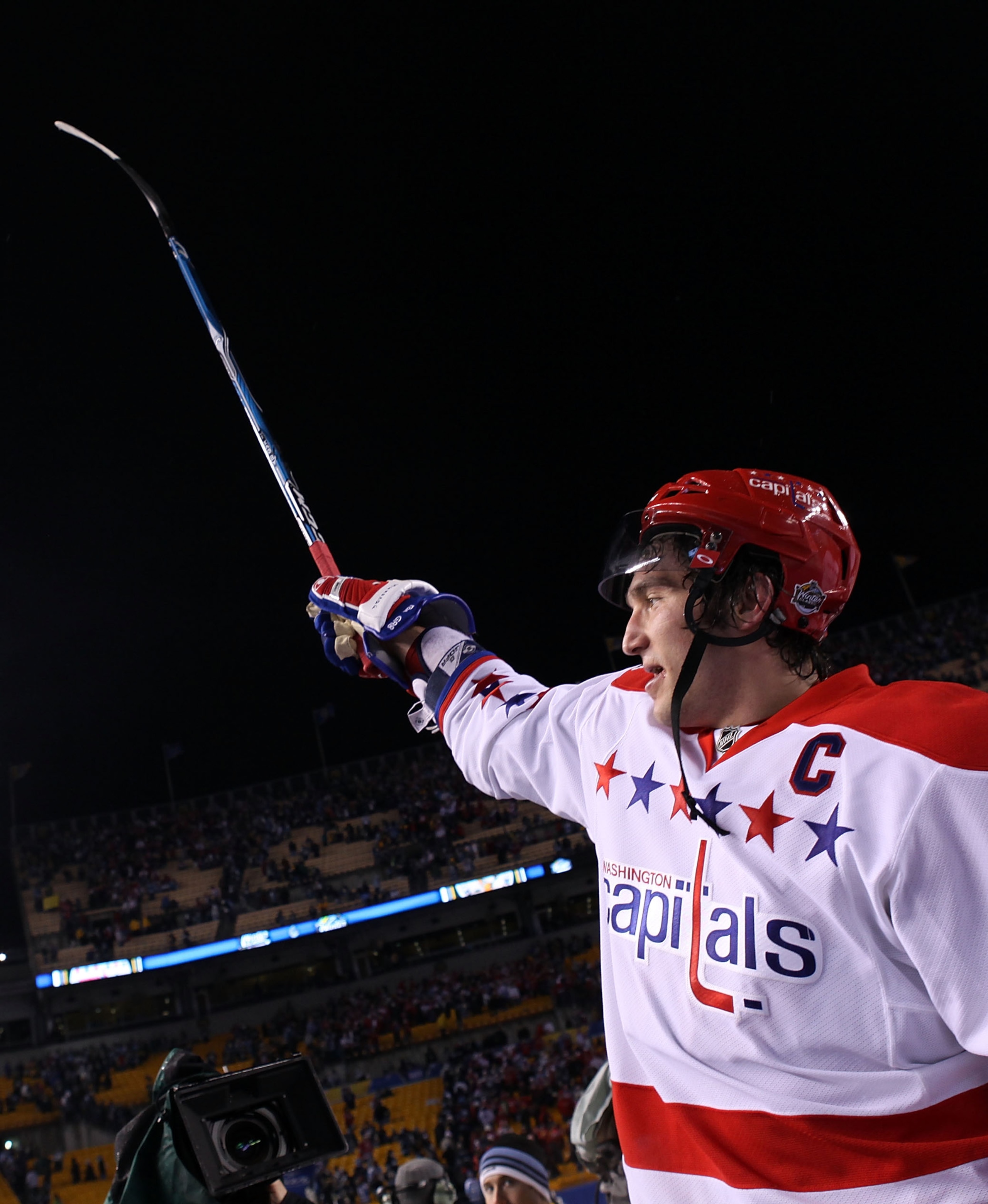 PITTSBURGH, PA - JANUARY 01: Alex Ovechkin #8 of the Washington Capitals celebrates their 3-1 victory over the Pittsburgh Penguins during the 2011 NHL Bridgestone Winter Classic at Heinz Field on January 1, 2011 in Pittsburgh, Pennsylvania. (Photo by Ja PITTSBURGH, PA - JANUARY 01: Alex Ovechkin #8 of the Washington Capitals celebrates their 3-1 victory over the Pittsburgh Penguins during the 2011 NHL Bridgestone Winter Classic at Heinz Field on January 1, 2011 in Pittsburgh, Pennsylvania. (Photo by Ja