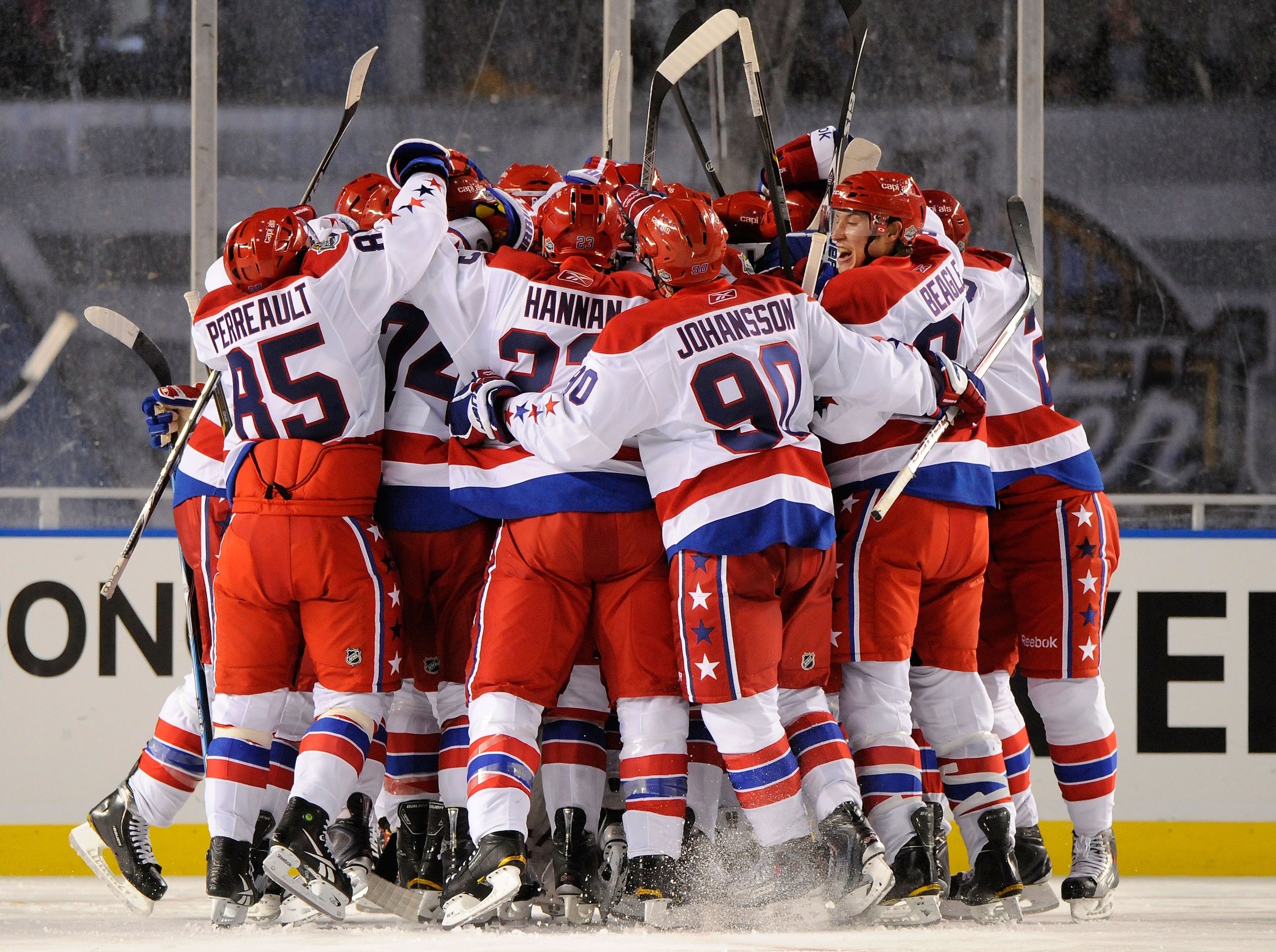 PITTSBURGH, PA - JANUARY 01: The Washington Capitals celebrate their 3-1 victory over the Pittsburgh Penguins during the 2011 NHL Bridgestone Winter Classic at Heinz Field on January 1, 2011 in Pittsburgh, Pennsylvania. (Photo by Jamie Sabau/Getty Image PITTSBURGH, PA - JANUARY 01: The Washington Capitals celebrate their 3-1 victory over the Pittsburgh Penguins during the 2011 NHL Bridgestone Winter Classic at Heinz Field on January 1, 2011 in Pittsburgh, Pennsylvania. (Photo by Jamie Sabau/Getty Image