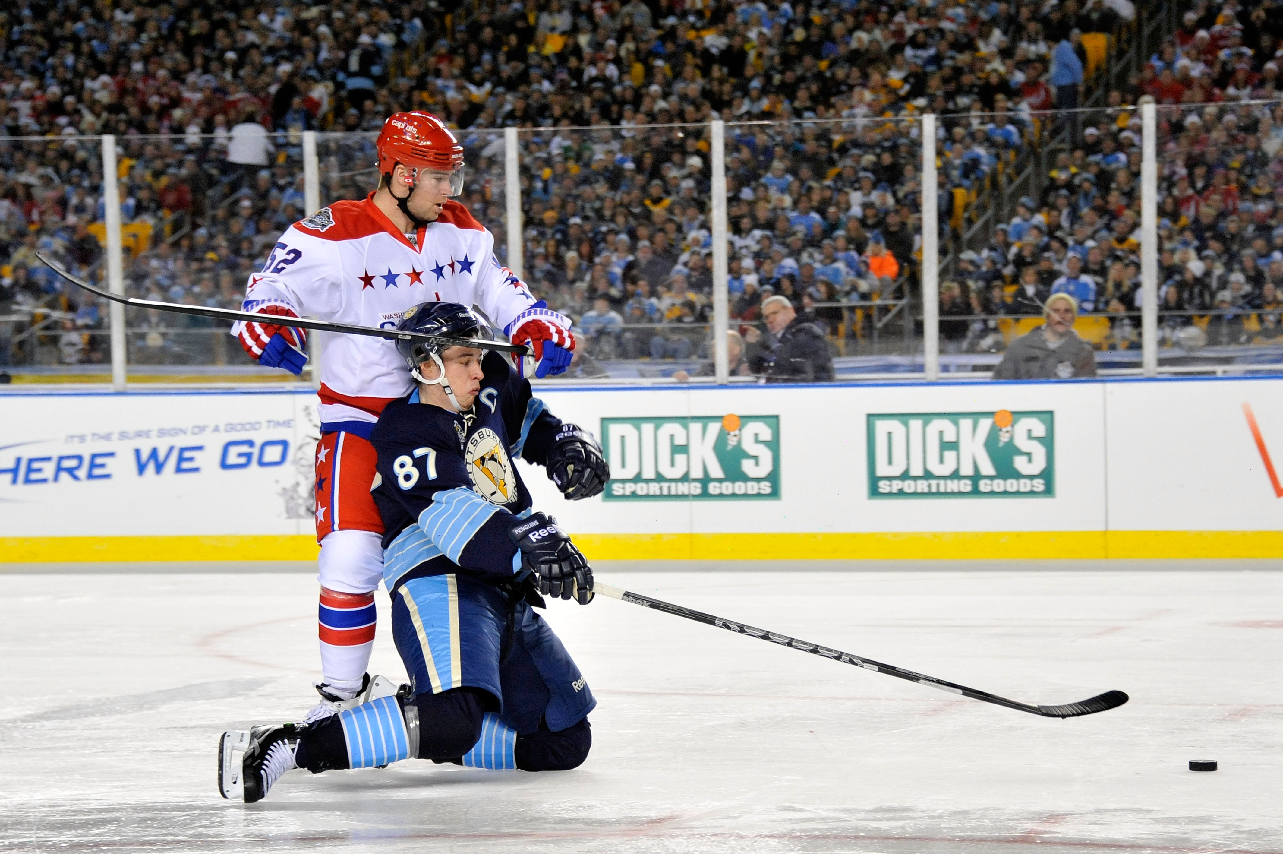 Alex Ovechkin the Washington Capitals fights Chris Kunitz of the Pittsburgh  Penguins during the 2011 NHL Bridgestone Winter Classic at Heinz Field on  January 1,…