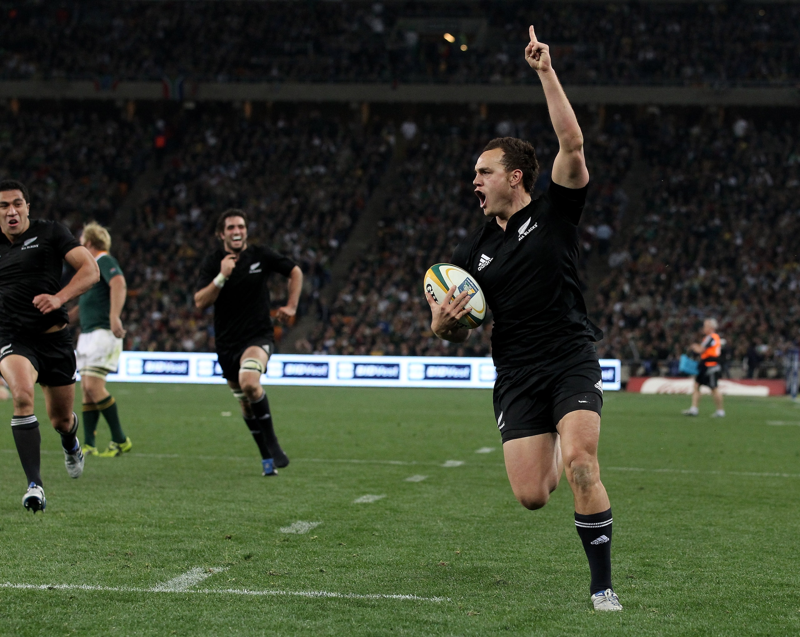 JOHANNESBURG, SOUTH AFRICA - AUGUST 21:  Israel Dagg of the All Blacks celebrates as he scores the match winning try during the 2010 Tri-Nations match between the South African Springboks and the New Zealand All Blacks at the FNB Stadium on August 21, 201