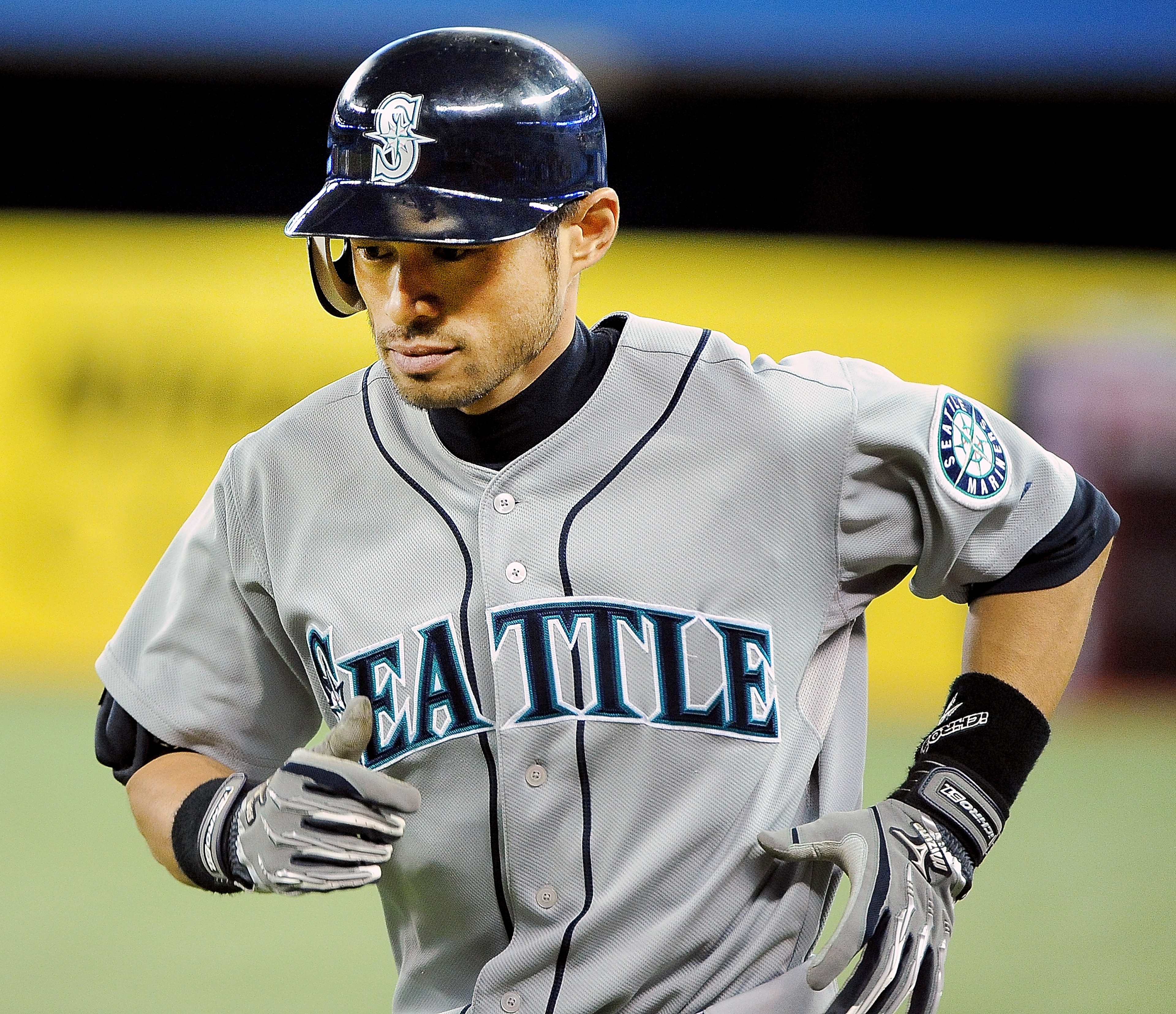TORONTO, ON - SEPTEMBER 22: Ichiro Suzuki #51 of the Seattle Mariners runs in from the field after being thrown out at 1st base during a game against the Toronto Blue Jays on September 22, 2010 at the Rogers Centre in Toronto, Canada. (Photo by Matthew Ma