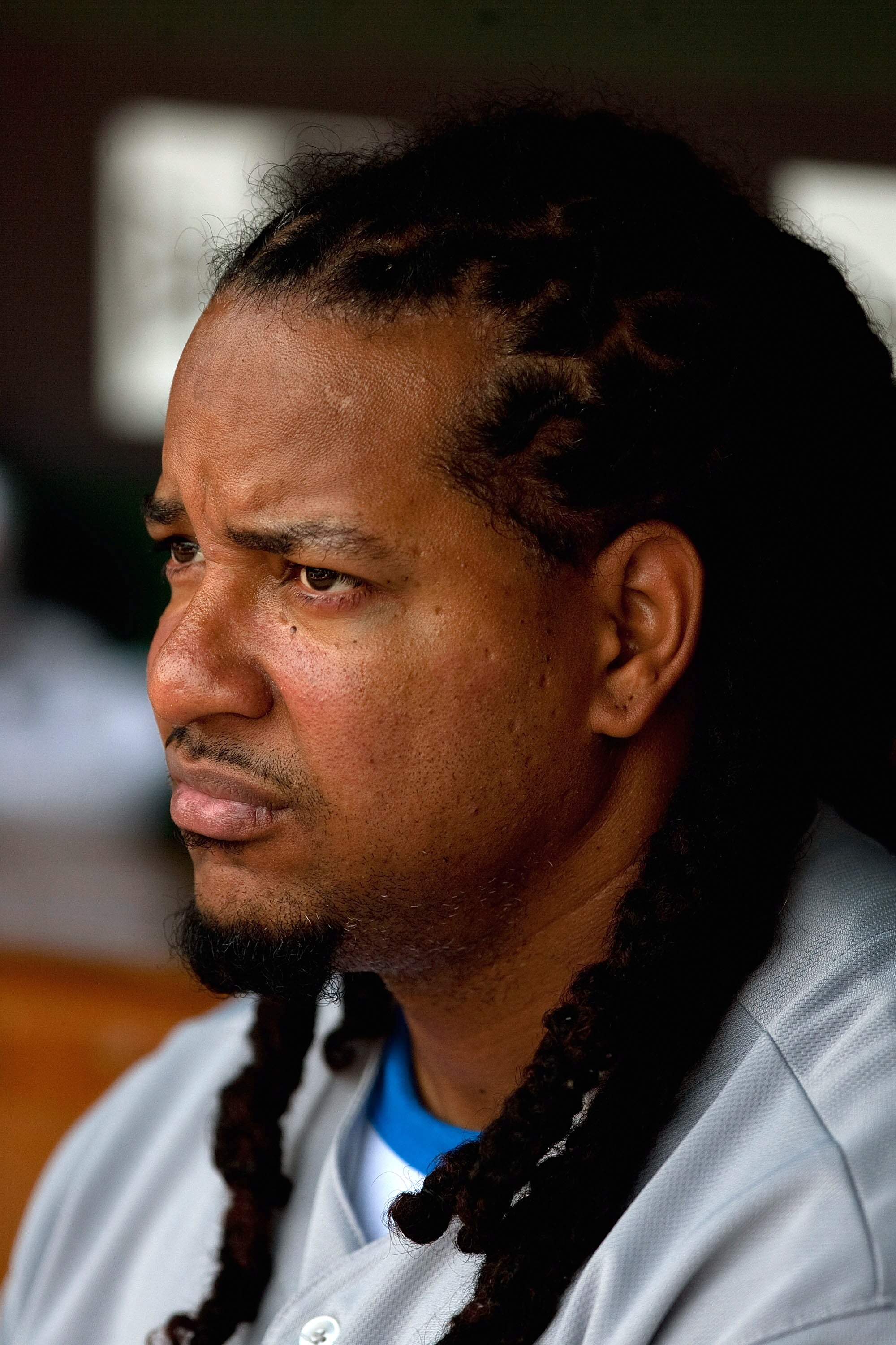 ST. LOUIS - JULY 18: Manny Ramirez #99 of the Los Angeles Dodgers looks on from the dugout against the St. Louis Cardinals at Busch Stadium on July 18, 2010 in St. Louis, Missouri.  The Cardinals beat the Dodgers 5-4.  (Photo by Dilip Vishwanat/Getty Imag