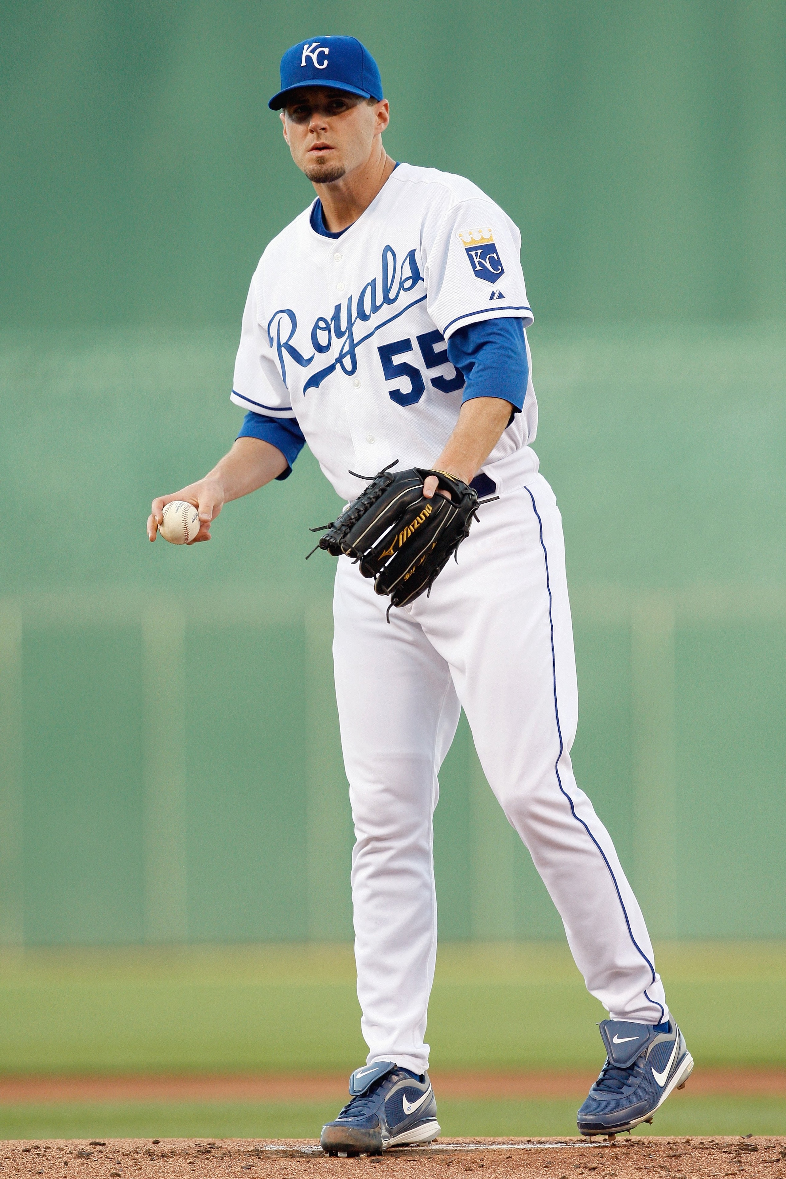 KANSAS CITY - MAY 14: Gil Meche #55 of the Kansas City Royals lines up the pitch during the game between the Baltimore Orioles on May 14, 2009 at Kauffman Stadium in Kansas City, Missouri. (Photo by: Jamie Squire/Getty Images)