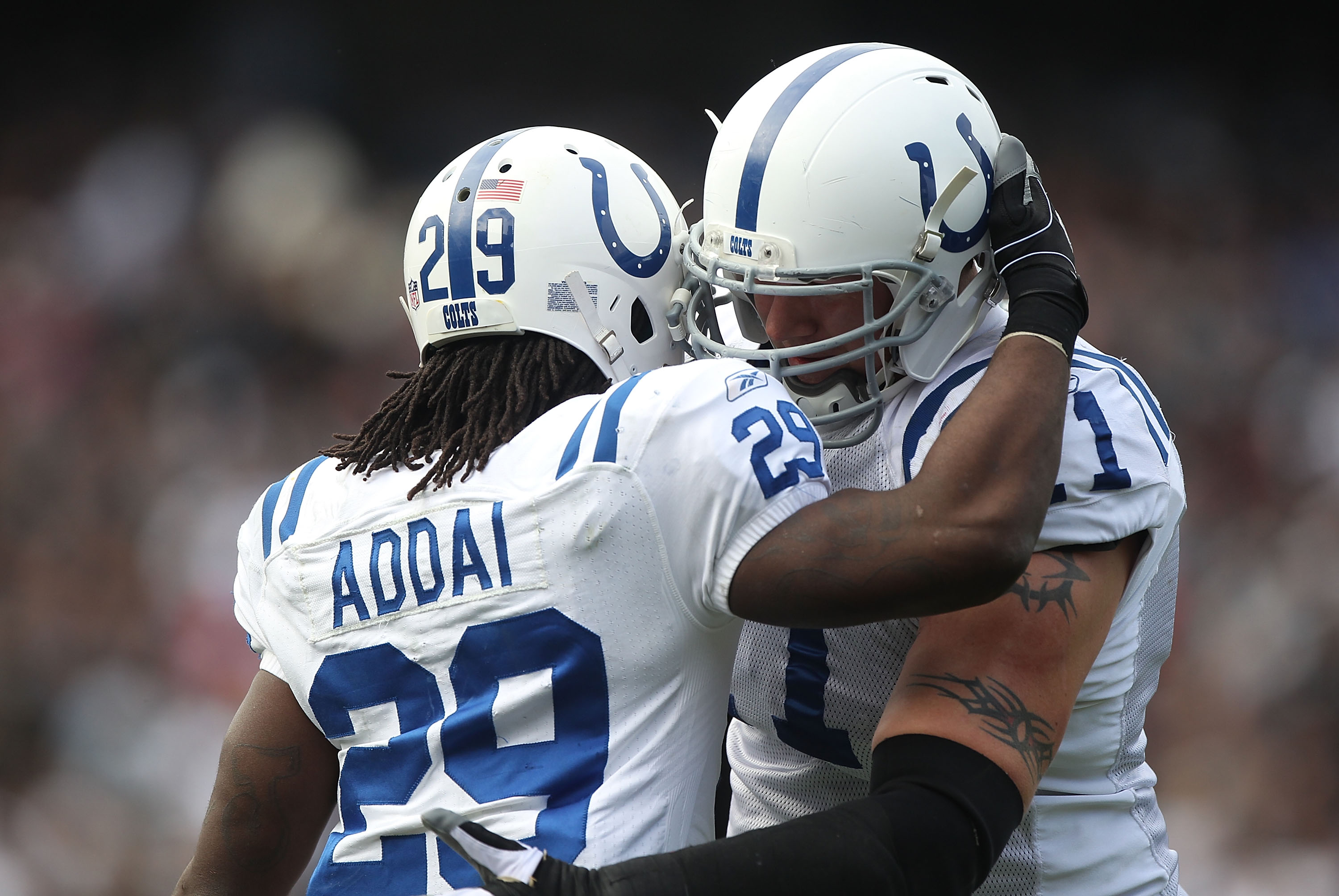 OAKLAND, CA - DECEMBER 26:  Joseph Addai #29 of the Indianapolis Colts celebrates with Jamey Richard #61 after scoring a touchdown against the Oakland Raiders during an NFL game at Oakland-Alameda County Coliseum on December  26, 2010 in Oakland, Californ
