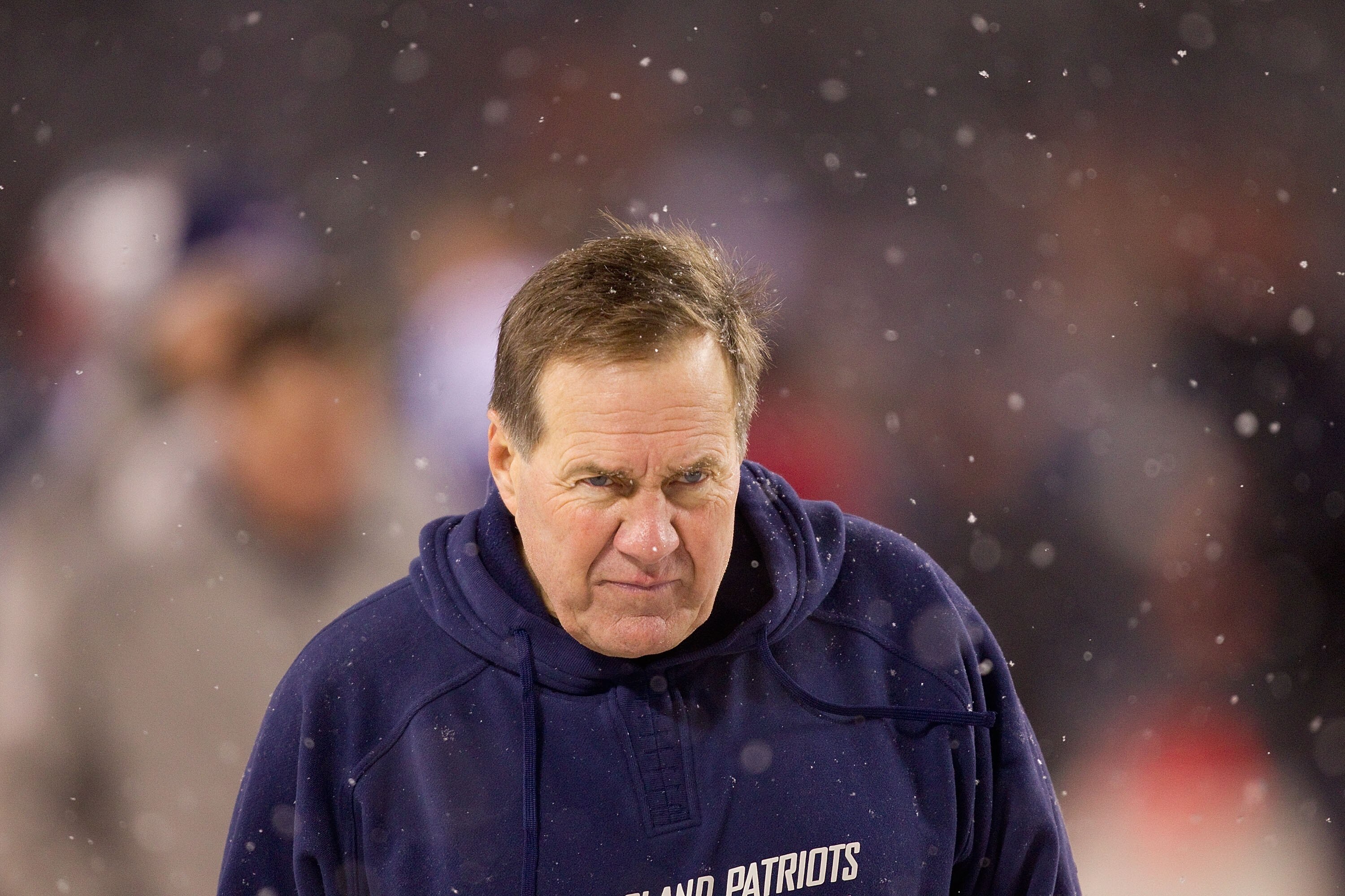 CHICAGO, IL - DECEMBER 12: Head coach Bill Belichick of the New England Patriots leaves the field after beating Chicago Bears at Soldier Field on December 12, 2010 in Chicago, Illinois.  The Patriots beat the Bears 36-7.  (Photo by Dilip Vishwanat/Getty I