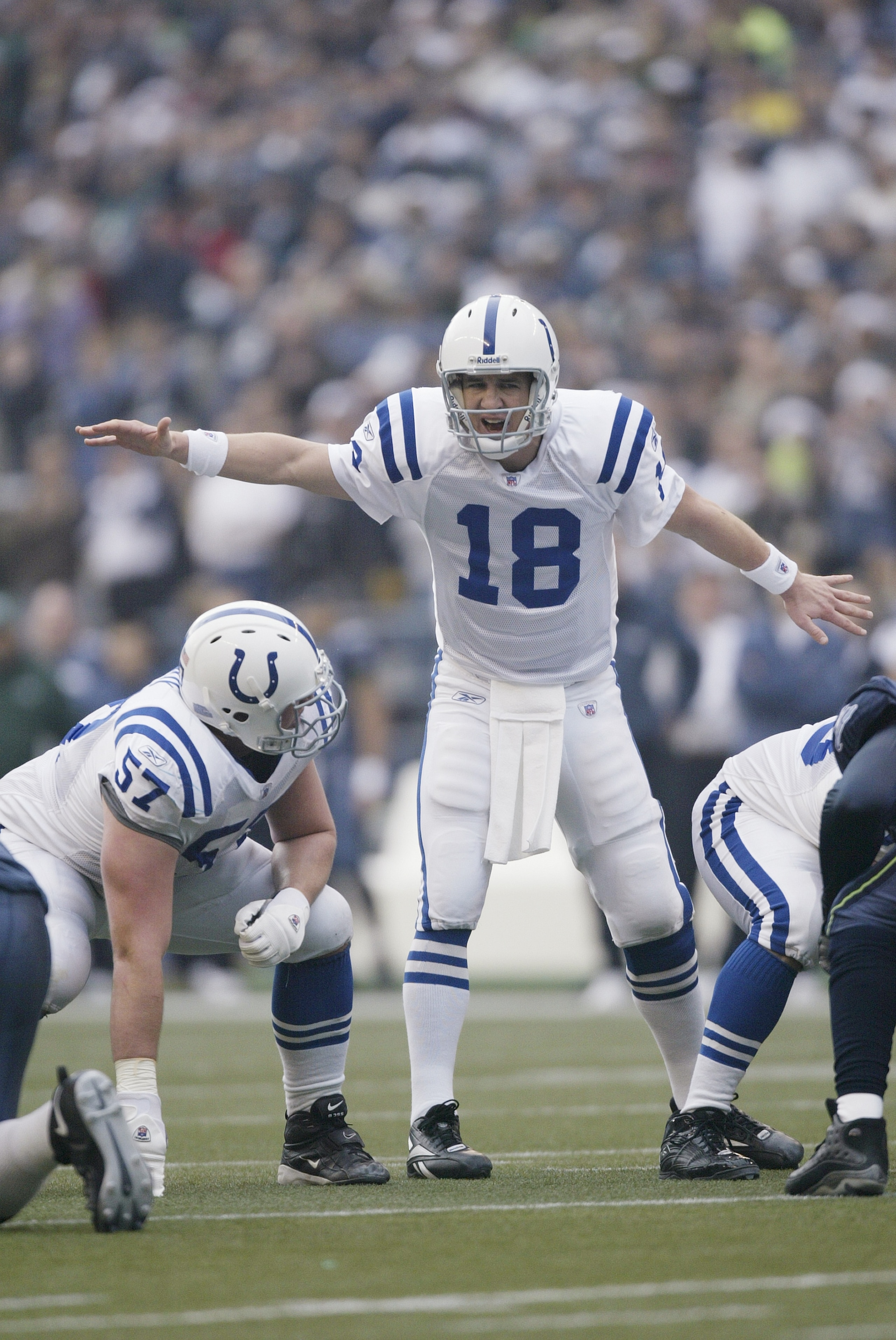 SEATTLE - DECEMBER 24:  Quarterback Peyton Manning #18 of the Indianapolis Colts calls out signals against the Seattle Seahawks at Qwest Field on December 24, 2005 in Seattle, Washington. The Seahawks defeated the Colts 28-13.  (Photo by Otto Greule Jr/Ge