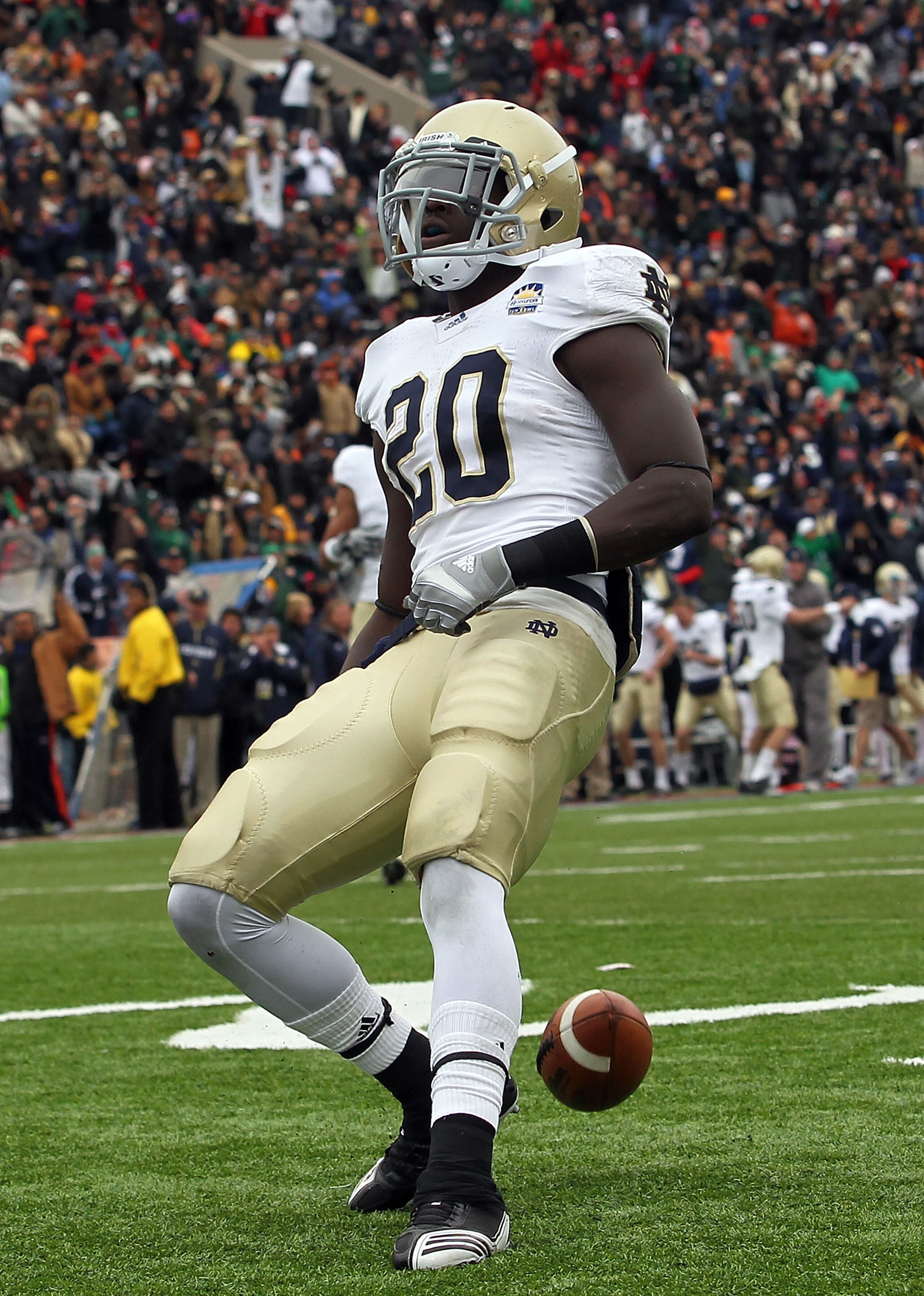EL PASO, TX - DECEMBER 30:  Running back Cierre Wood #20 of the Notre Dame Fighting Irish celebrates a touchdown against the Miami Hurricanes during the Hyundai Sun Bowl at Sun Bowl on December 30, 2010 in El Paso, Texas.  (Photo by Ronald Martinez/Getty