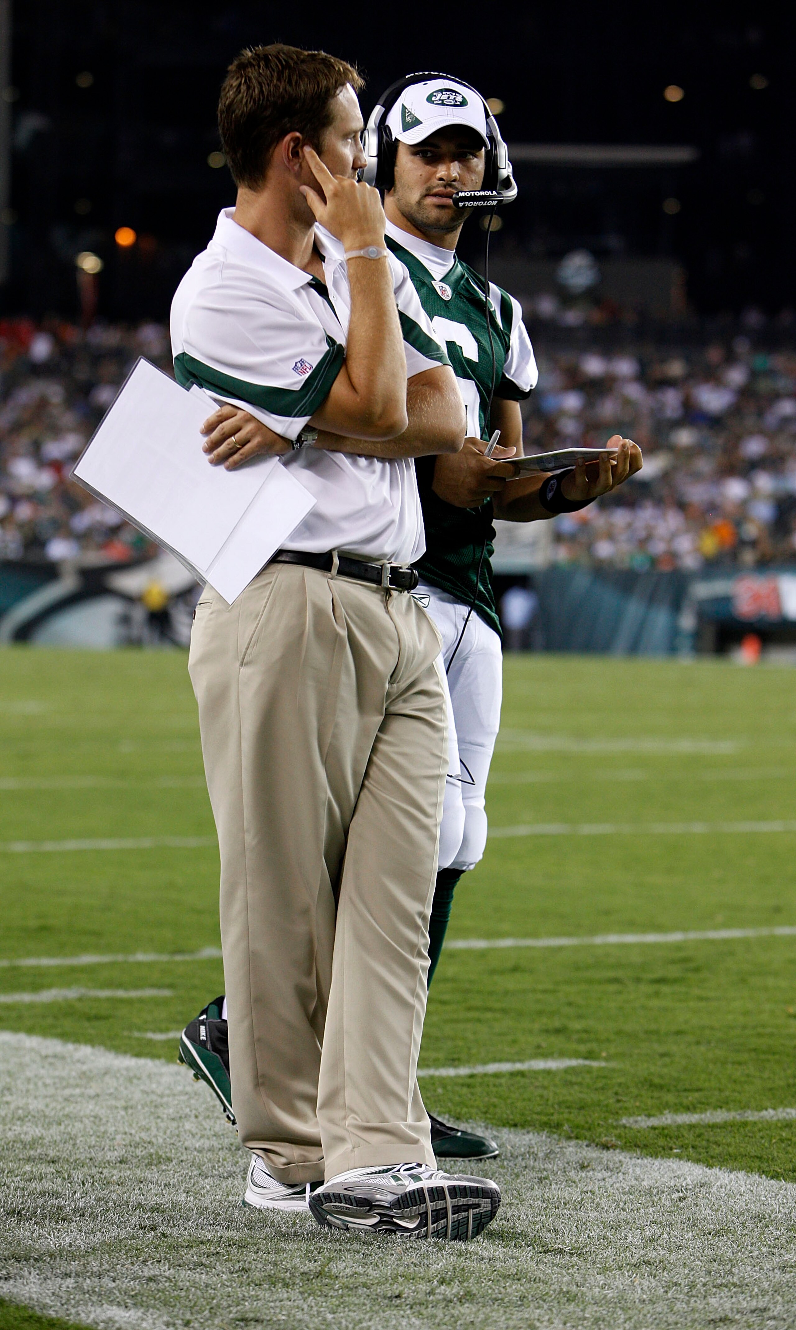 PHILADELPHIA - SEPTEMBER 02: Mark Sanchez #6 and offensive coordinator Brian Schottenheimer of the New York Jets look on during a preseason game against the Philadelphia Eagles at Lincoln Financial Field on September 2, 2010 in Philadelphia, Pennsylvania.