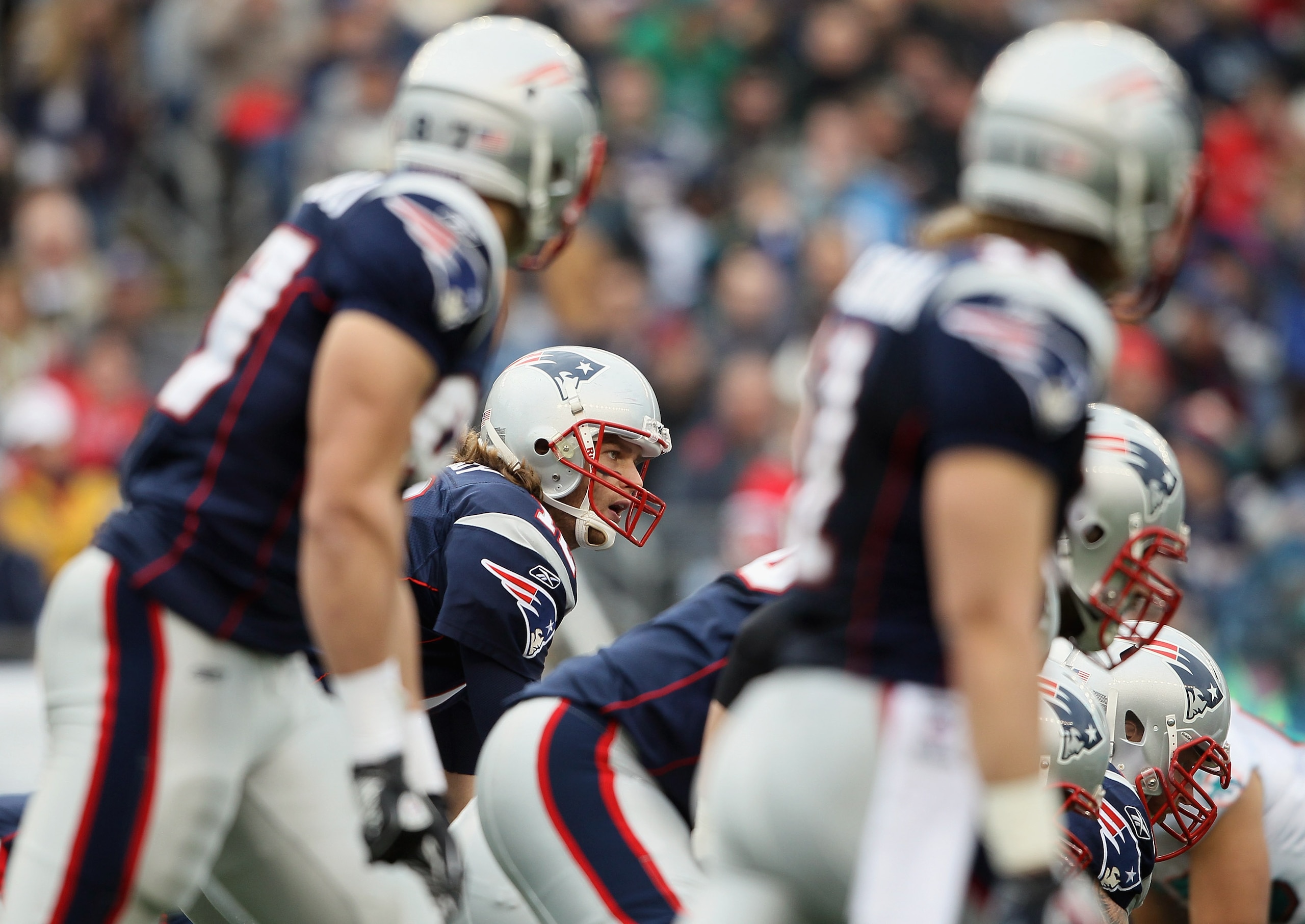 FOXBORO, MA - JANUARY 02:  Tom Brady #12 of the New England Patriots calls out the play in the first half against the Miami Dolphins on January 2, 2011 at Gillette Stadium in Foxboro, Massachusetts.  (Photo by Elsa/Getty Images)