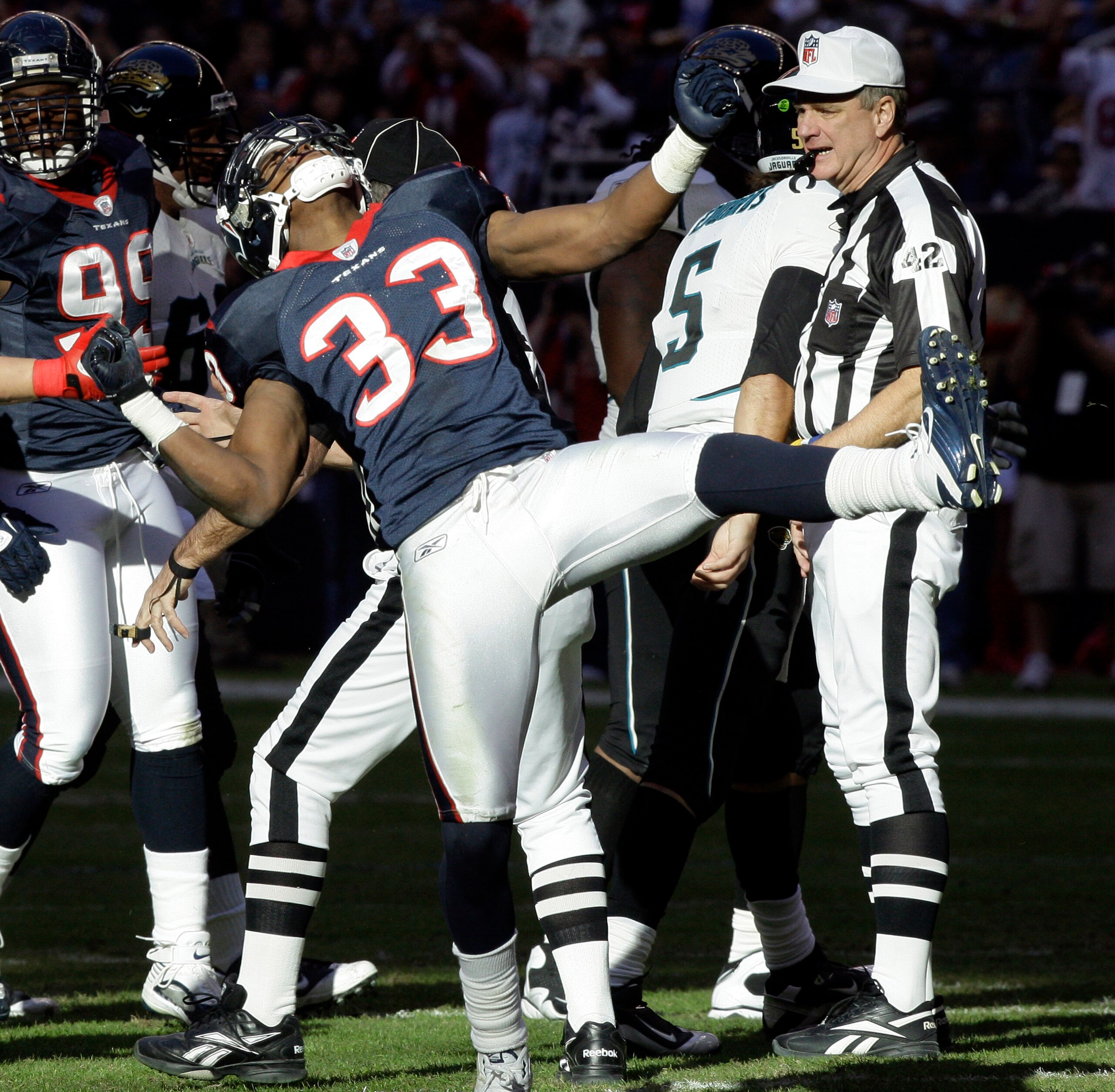 HOUSTON - JANUARY 02:  Troy Nolan #33 of the Houston Texans celebrates after sacking quarterbacl Trent Edwards #5 of the Jacksonville Jaguars at Reliant Stadium on January 2, 2011 in Houston, Texas.  (Photo by Bob Levey/Getty Images)