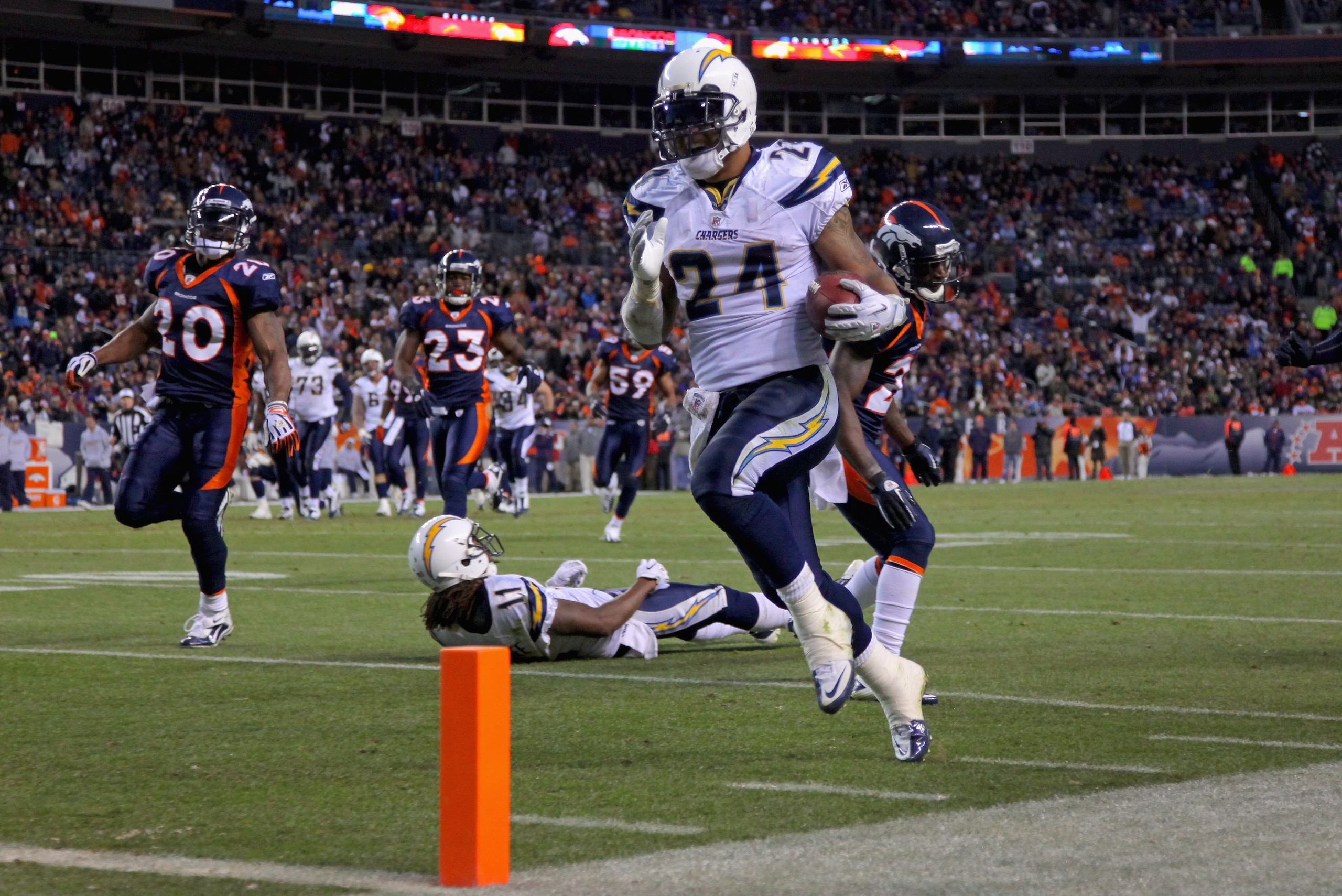 DENVER - JANUARY 02:  Running back Ryan Mathews #24 of the San Diego Chargers steps into the endzone as he rushes for a 31 yard touchdown on fourth down and one yard to go in the fourth quarter against the Denver Broncos at INVESCO Field at Mile High on J