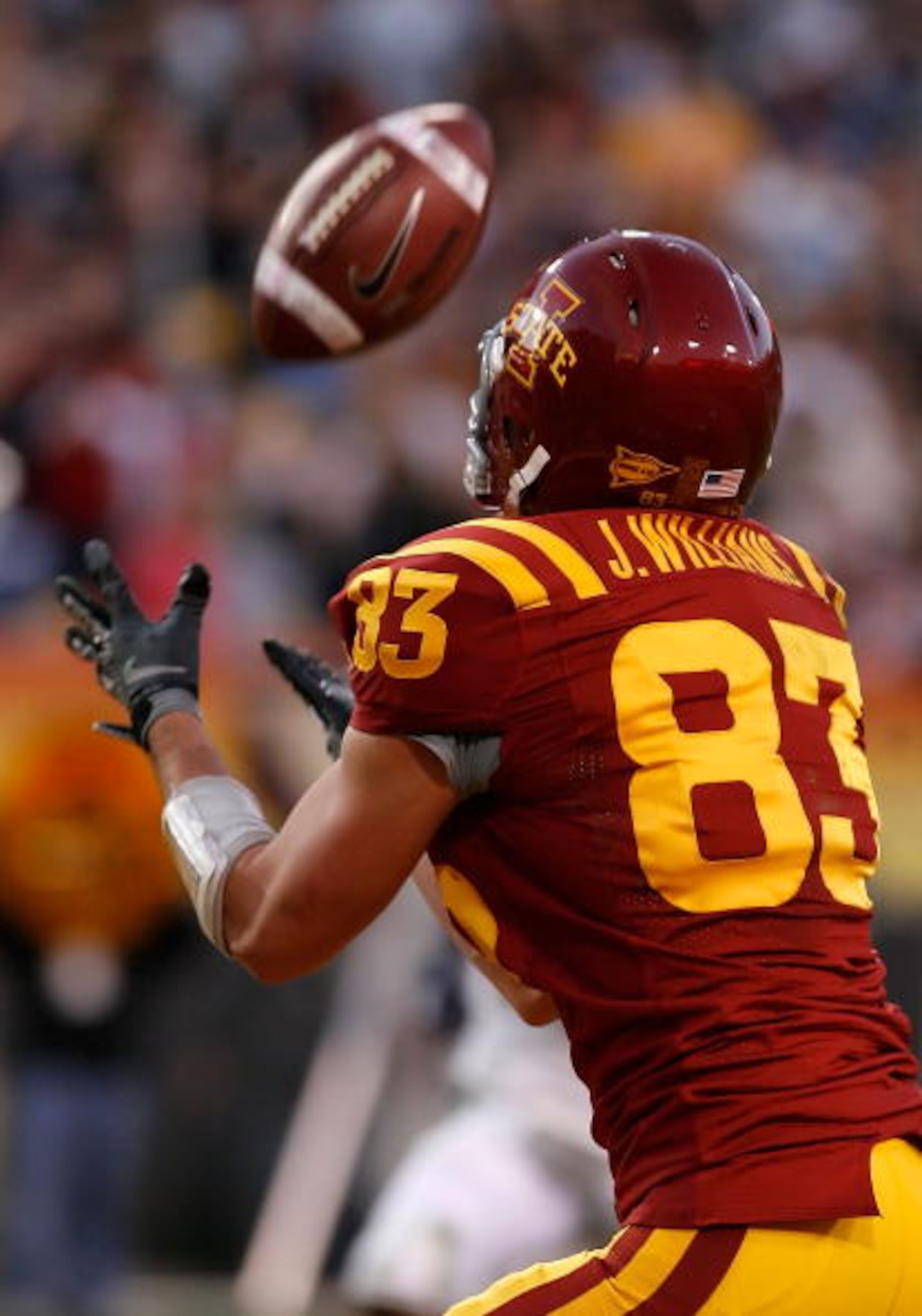 TEMPE, AZ - DECEMBER 31:  Wide receiver Jake Williams #13 of the Iowa State Cyclones catches a 38 yard touchdown reception against the Minnesota Golden Gophers during the Insight Bowl at Arizona Stadium on December 31, 2009 in Tempe, Arizona. The Cyclones