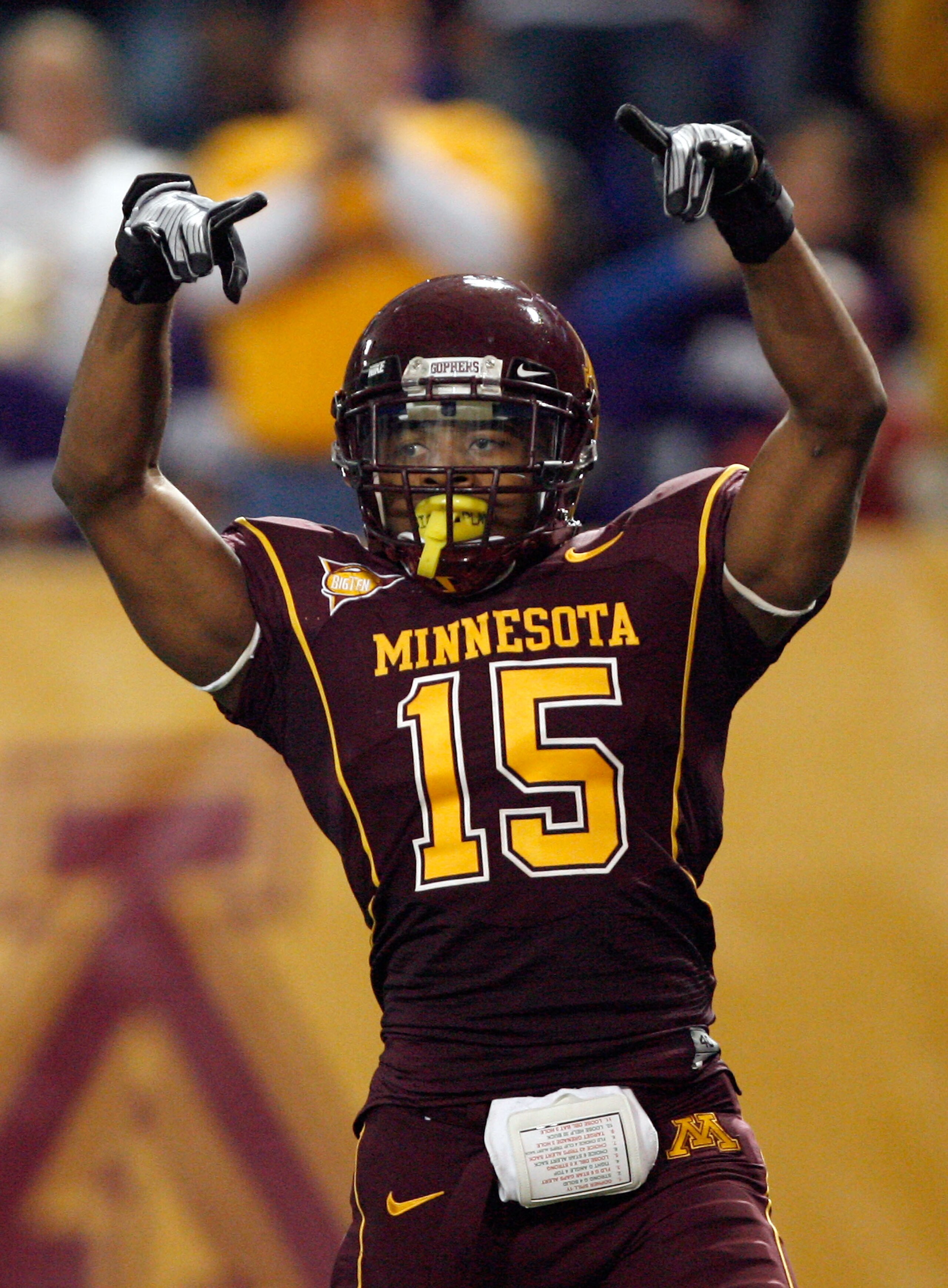 MINNEAPOLIS - NOVEMBER 01: Traye Simmons #15 of the Minnesota Golden Gophers celebrates his interception for a touchdown for a 14-10 lead over the Northwestern Wildcats during the second quarter at the Hubert H.Humphrey Metrodome on November 1, 2008 in Mi