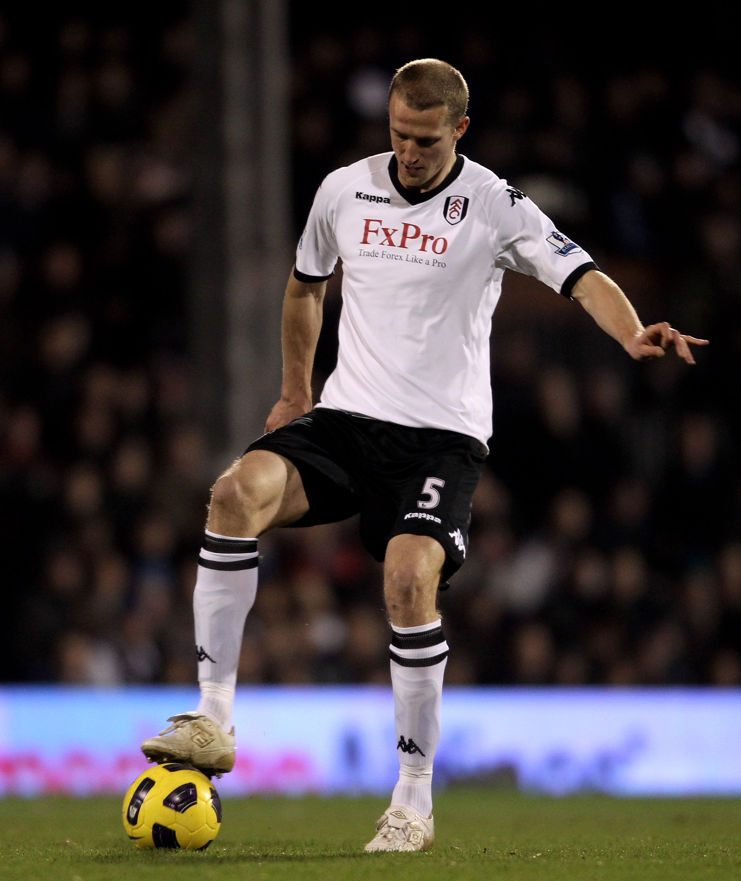 LONDON, ENGLAND - JANUARY 04:  Brede Hangeland of Fulham controls the ball during the Barclays Premier League match between Fulham and West Bromwich Albion at Craven Cottage on January 4, 2011 in London, England.  (Photo by Scott Heavey/Getty Images)